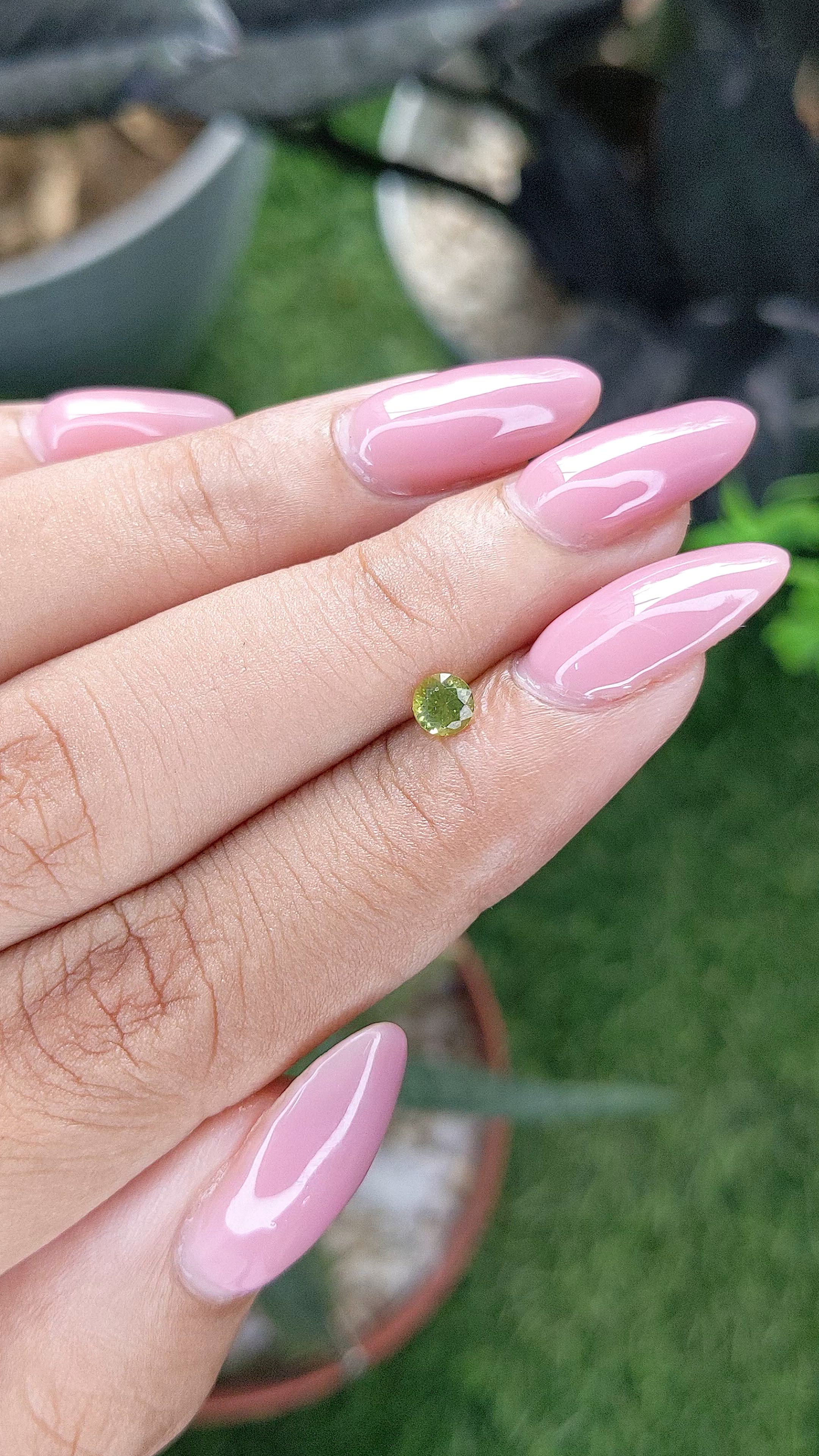 0.27 Ct. Yellowish Green Peridot from Tanzania Size Video