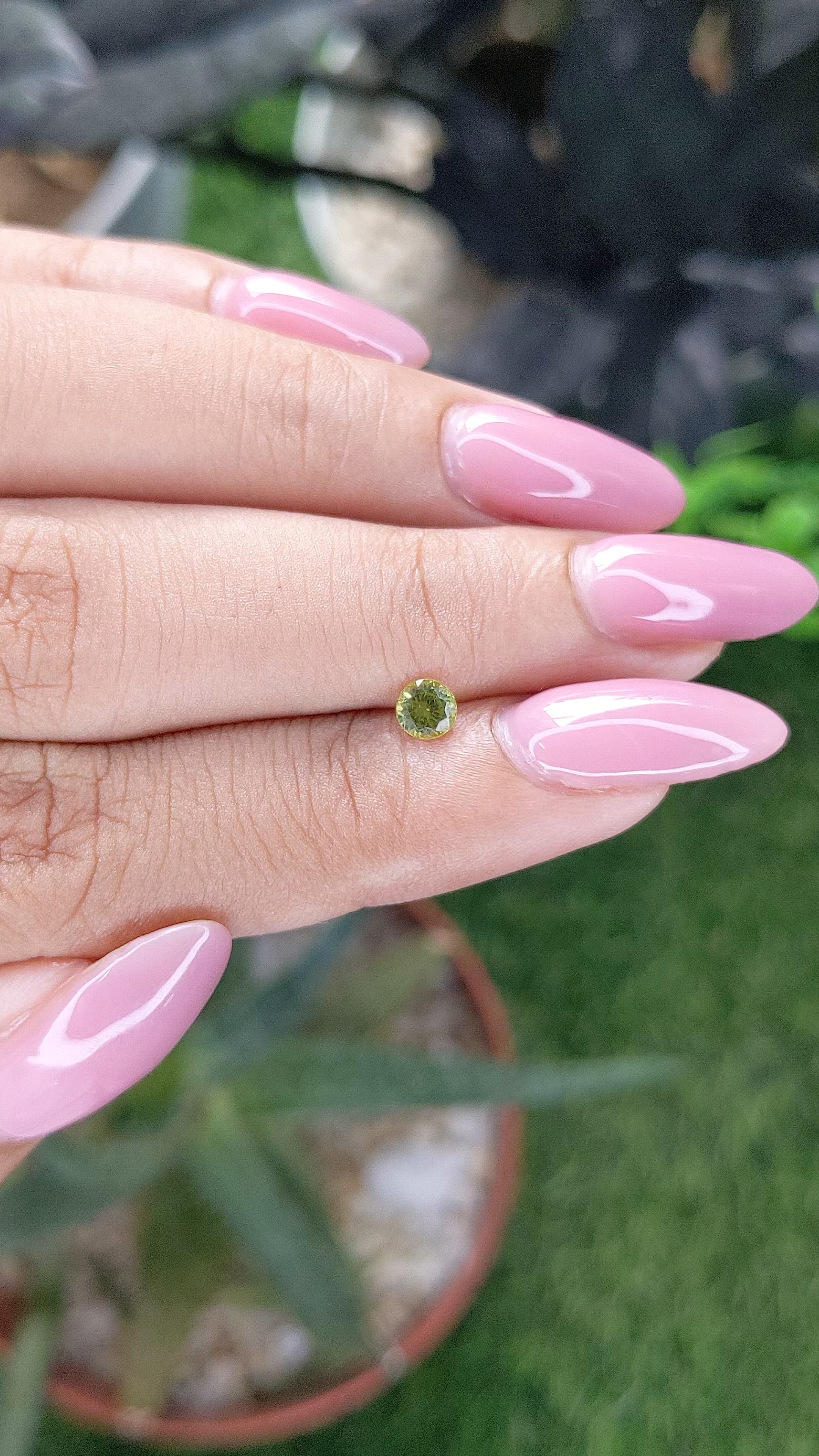 0.25 Ct. Yellowish Green Peridot from Tanzania Size Video