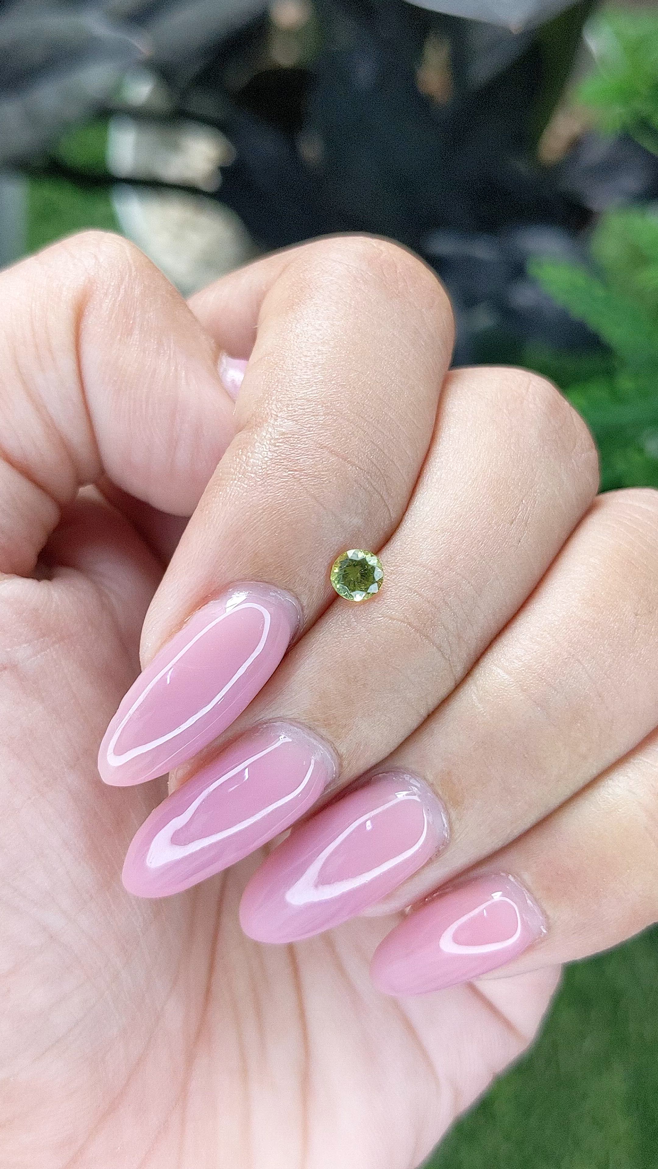 0.25 Ct. Yellowish Green Peridot from Tanzania Size Video
