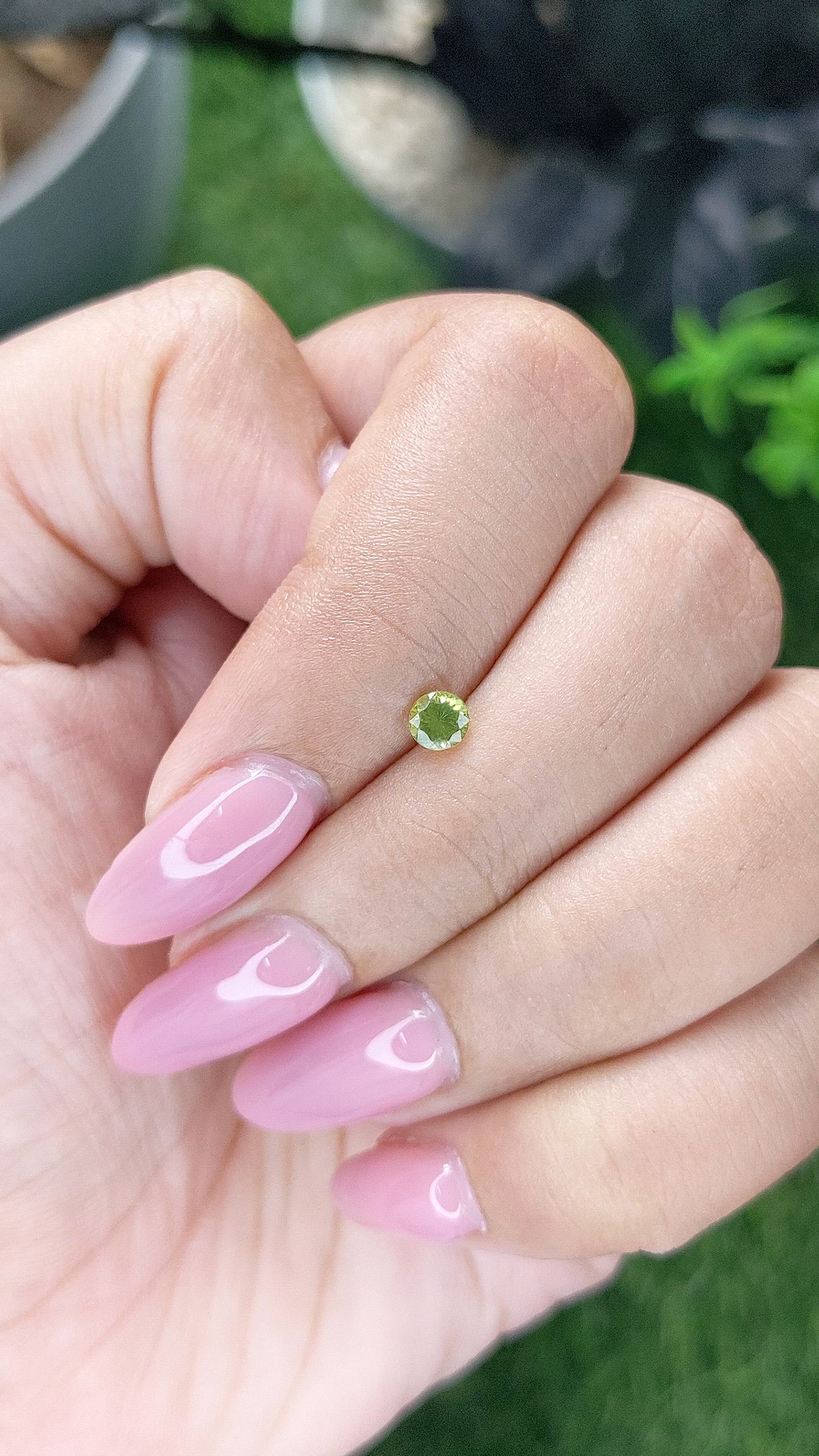 0.22 Ct. Yellowish Green Peridot from Tanzania Size Video