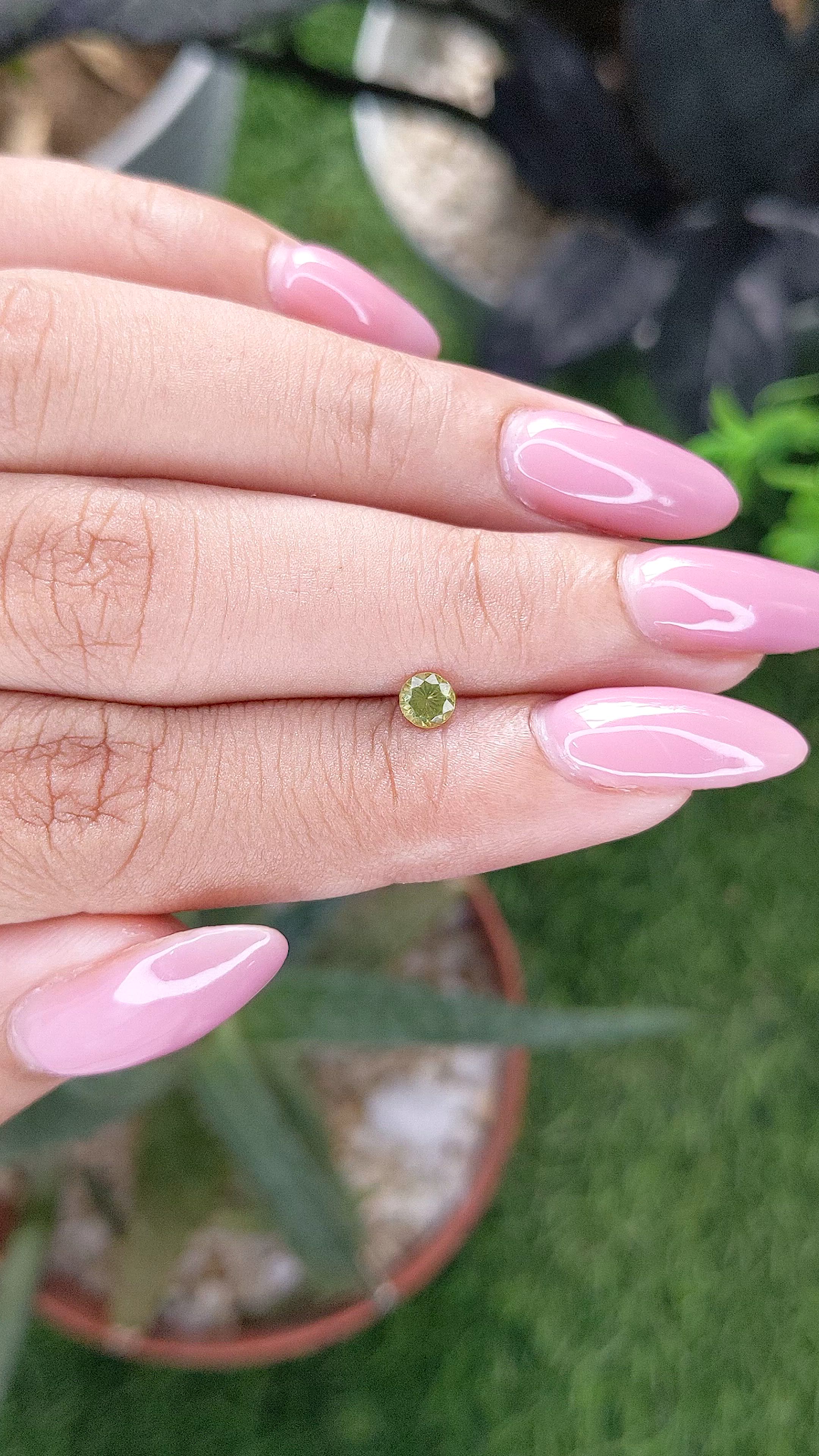 0.22 Ct. Yellowish Green Peridot from Tanzania Size Video