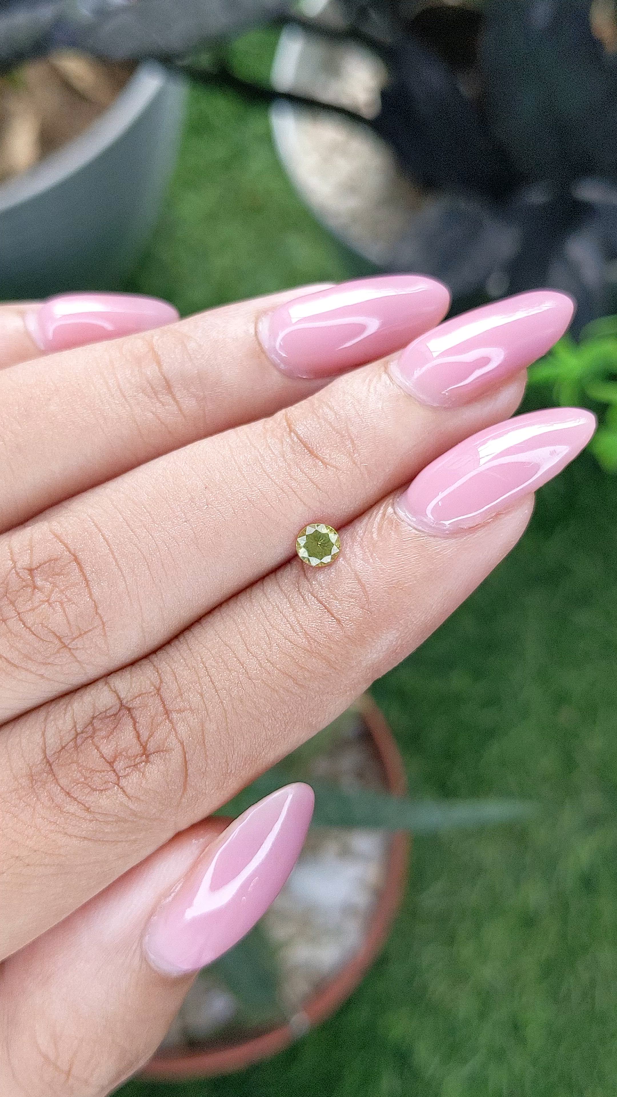 0.22 Ct. Yellowish Green Peridot from Tanzania Size Video