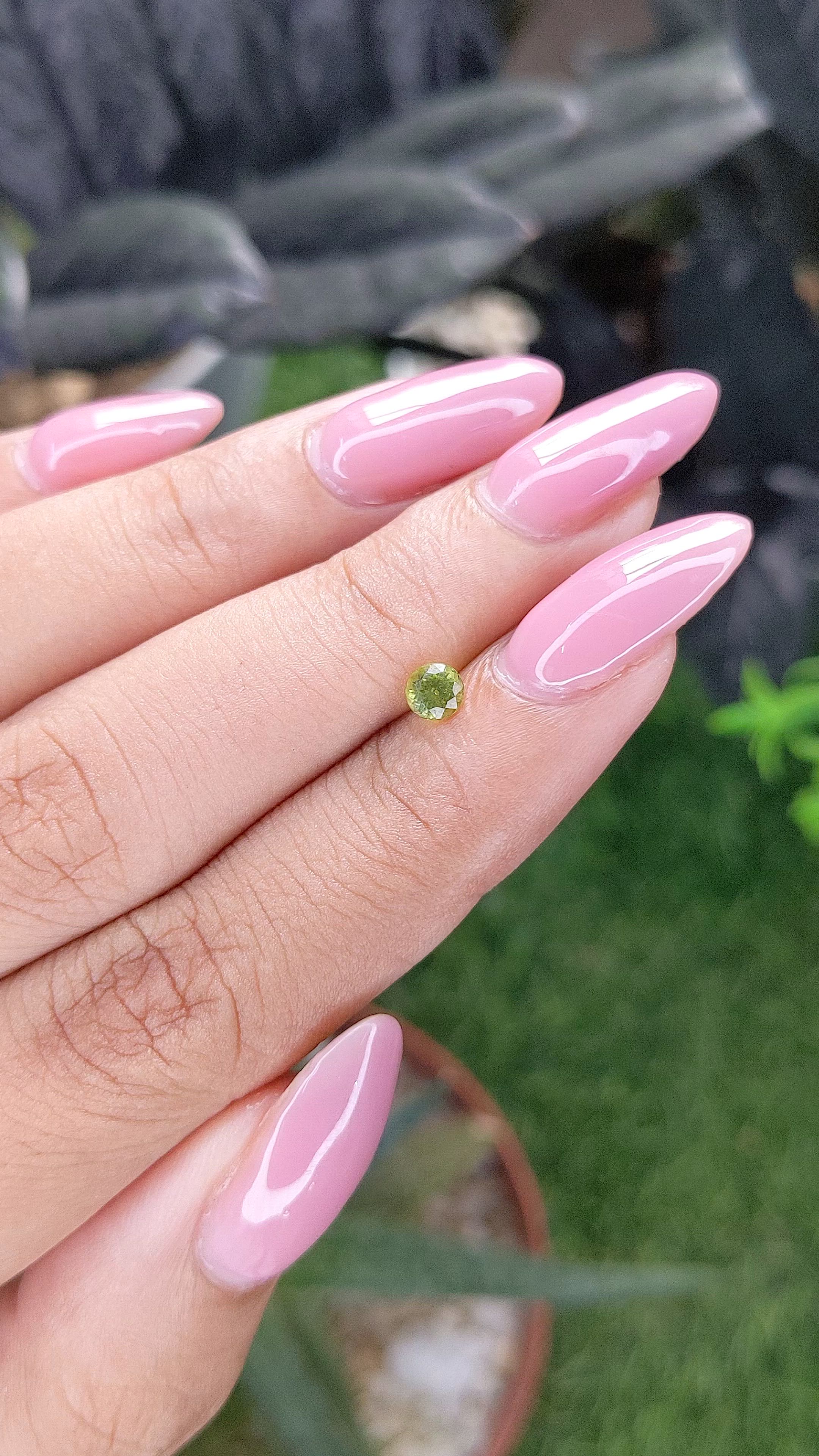 0.28 Ct. Yellowish Green Peridot from Tanzania Size Video