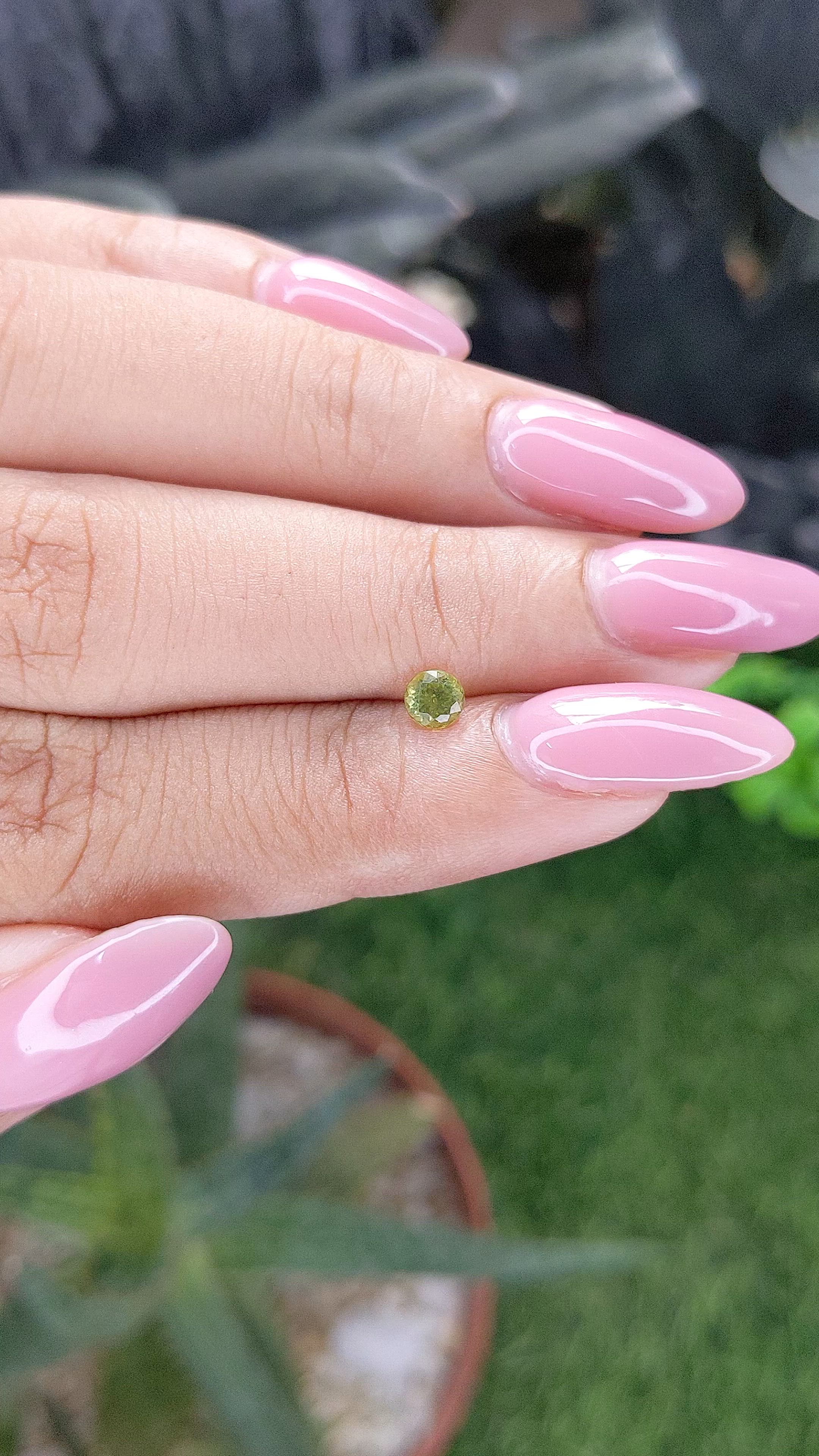 0.28 Ct. Yellowish Green Peridot from Tanzania Size Video
