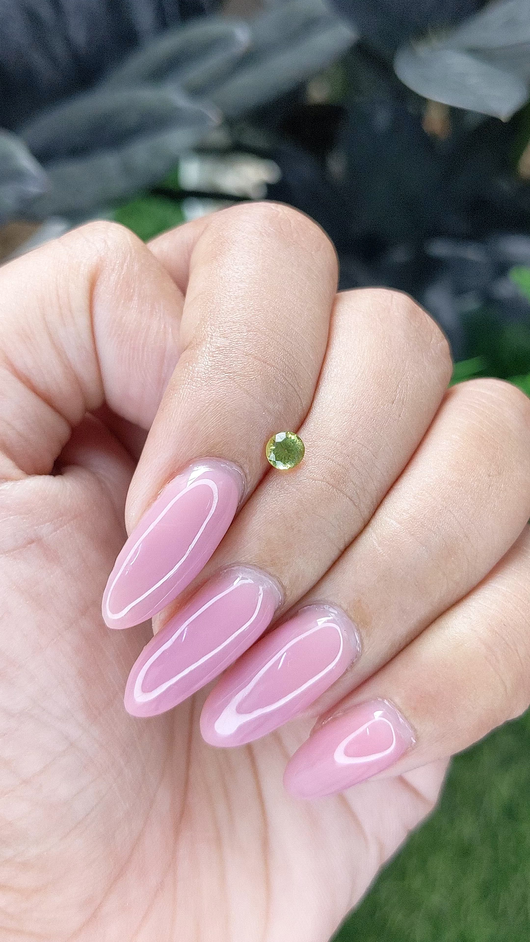 0.28 Ct. Yellowish Green Peridot from Tanzania Size Video