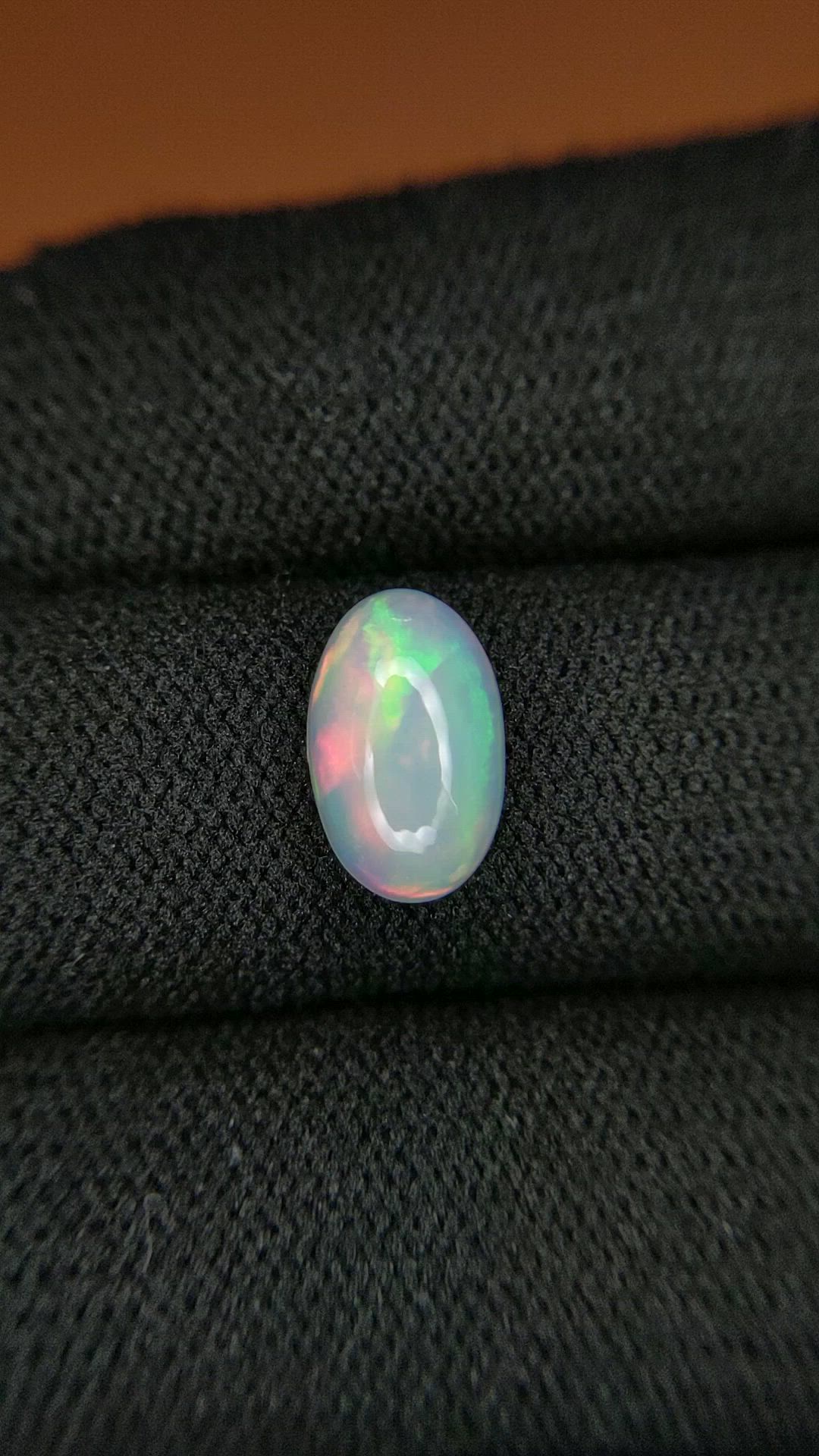 1.55 Ct. Multi Color Cabochon Fire Opal (Flame Opal) from Ethiopia Size Video