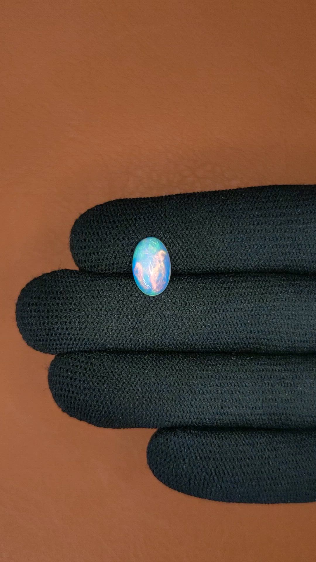 2.21 Ct. Multi Color Cabochon Fire Opal (Flame Opal) from Ethiopia Size Video