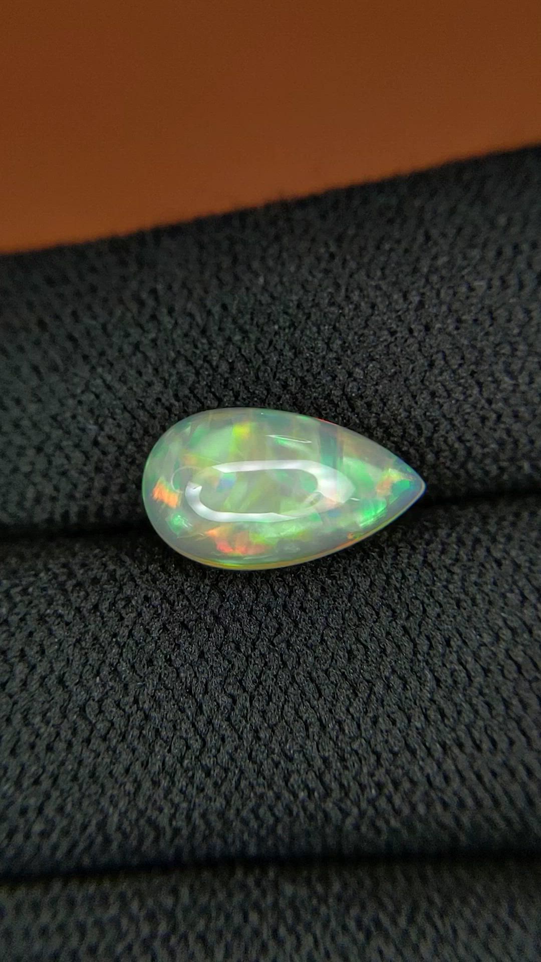 2.38 Ct. Multi Color Cabochon Fire Opal (Flame Opal) from Ethiopia Size Video