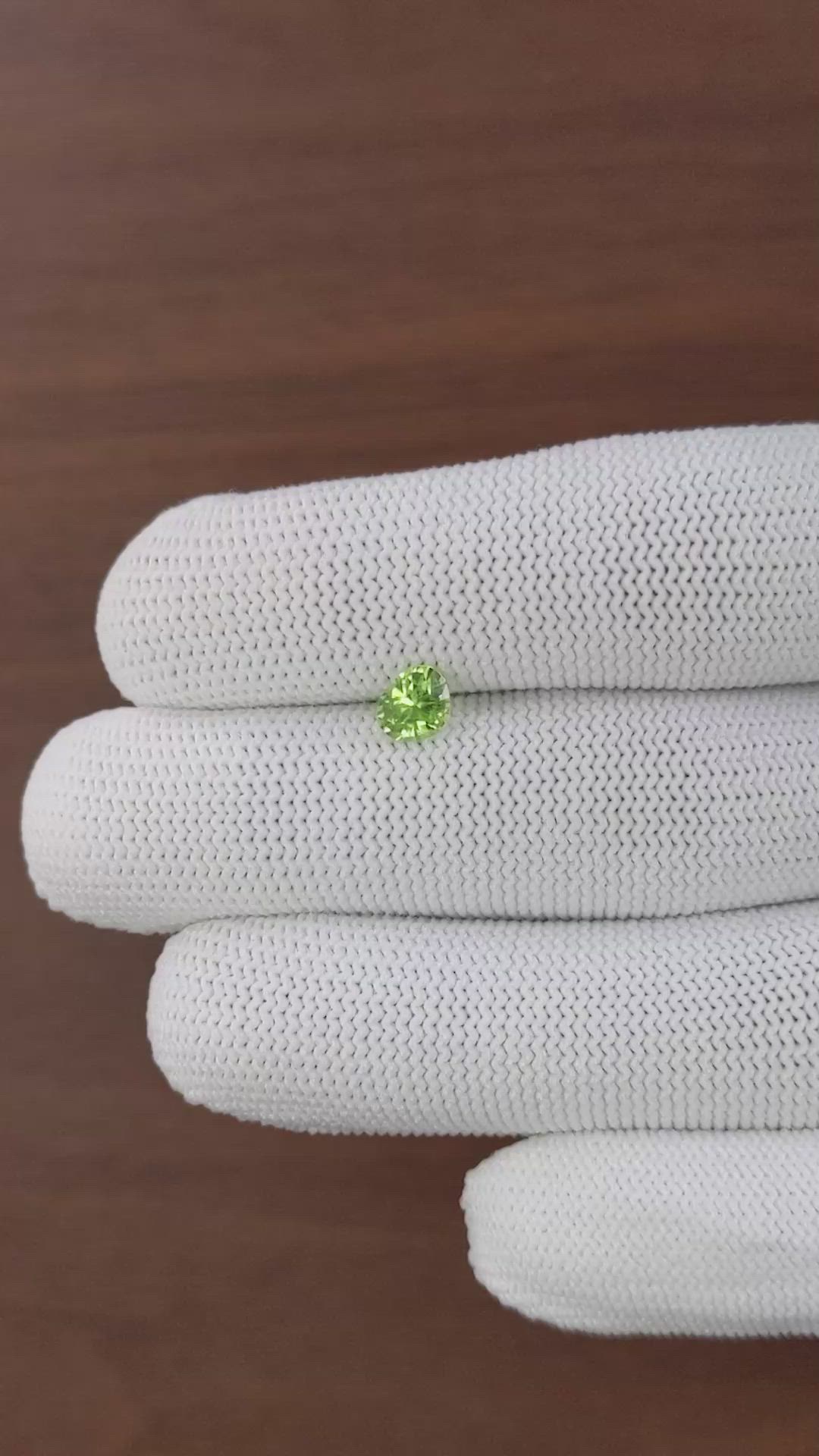 0.69 Ct. Yellowish Green Peridot from Tanzania Size Video