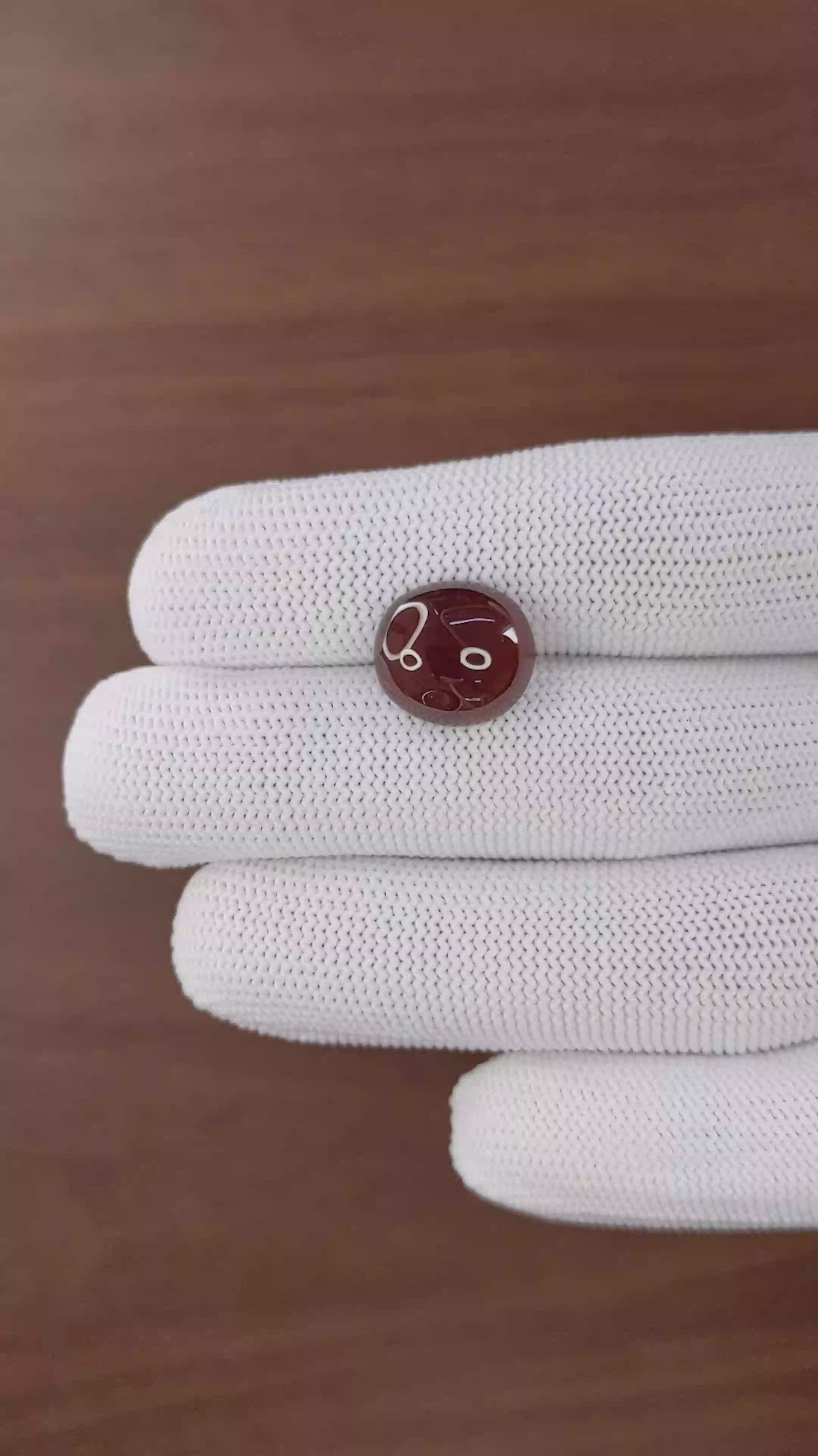 10.37 Ct. Reddish Brown Cabochon Garnet from South Africa Size Video