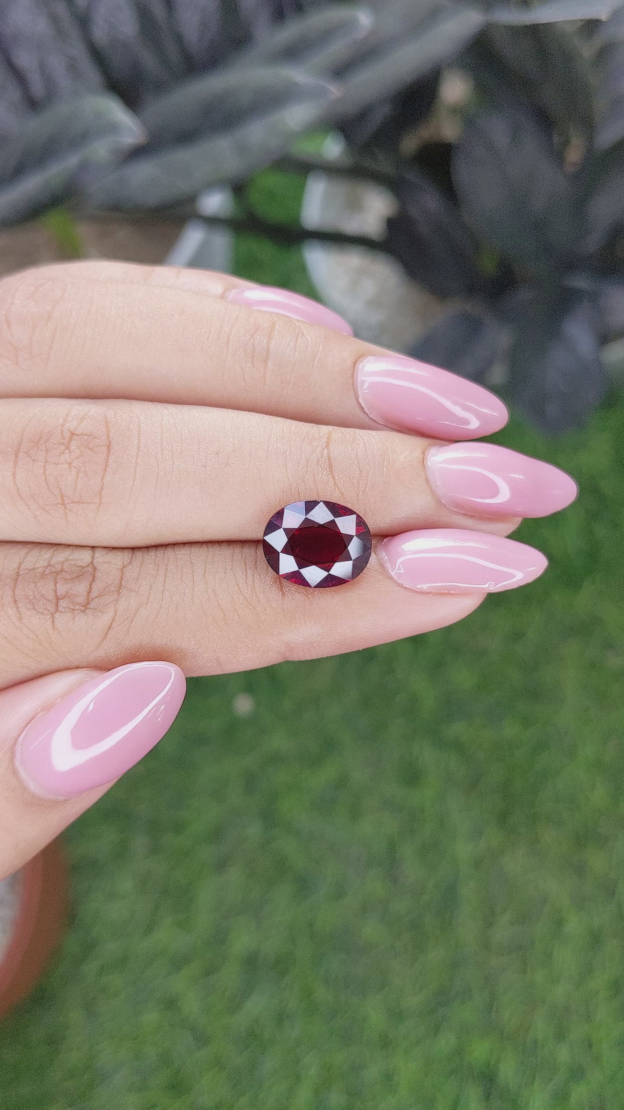 4.89 Ct. Orangish Red Garnet from Ceylon (Sri Lanka) Size Video