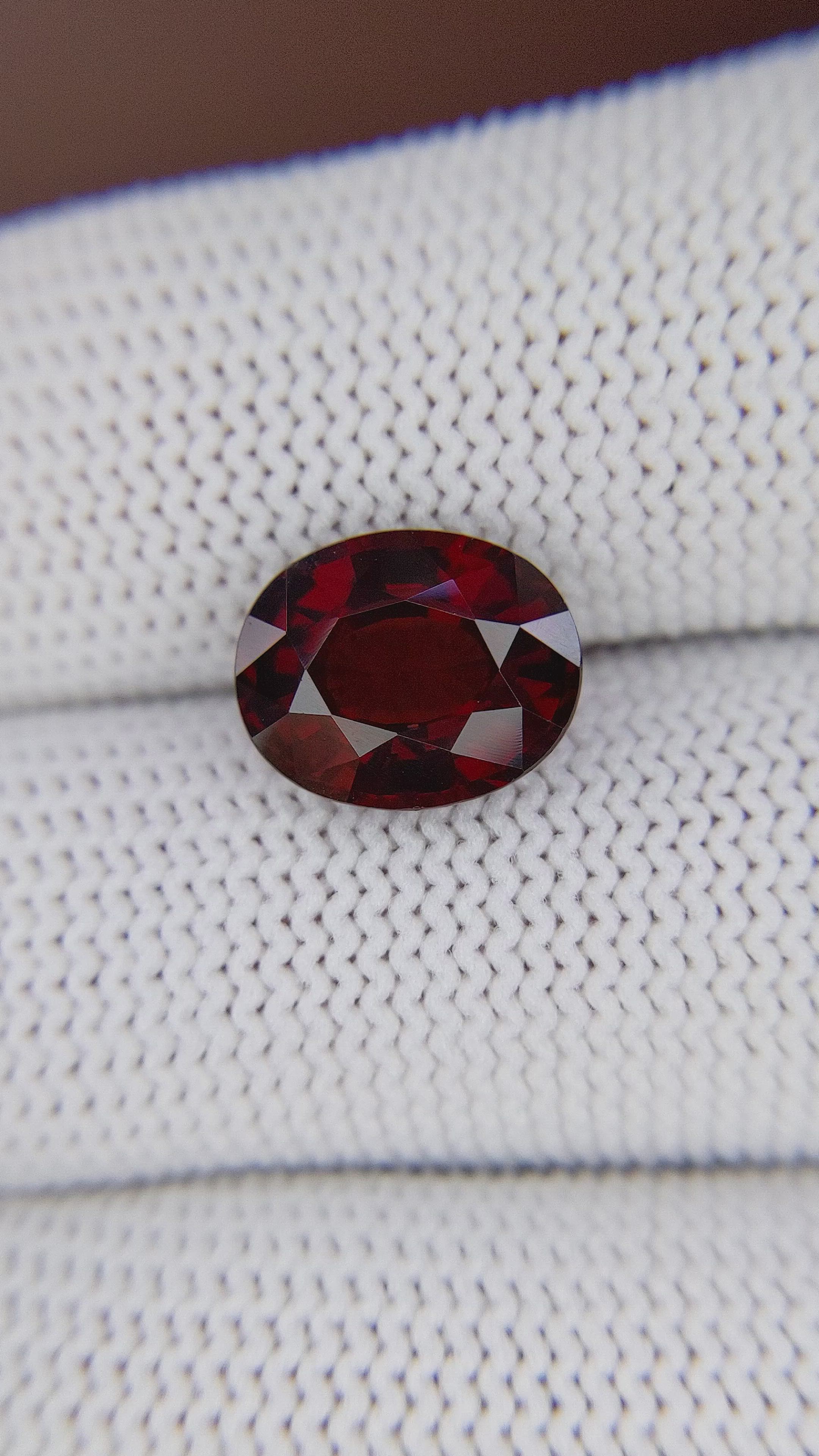 4.89 Ct. Orangish Red Garnet from Ceylon (Sri Lanka) Size Video