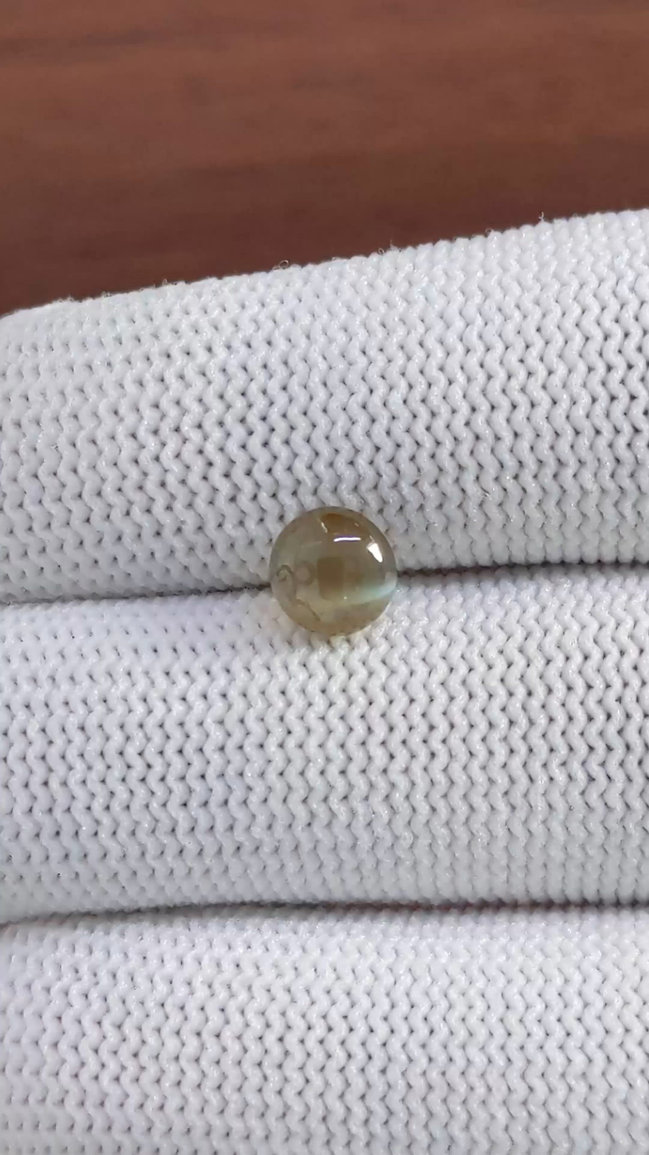 2.12 Ct. Yellowish Green Cabochon Chrysoberyl from Tanzania Size Video