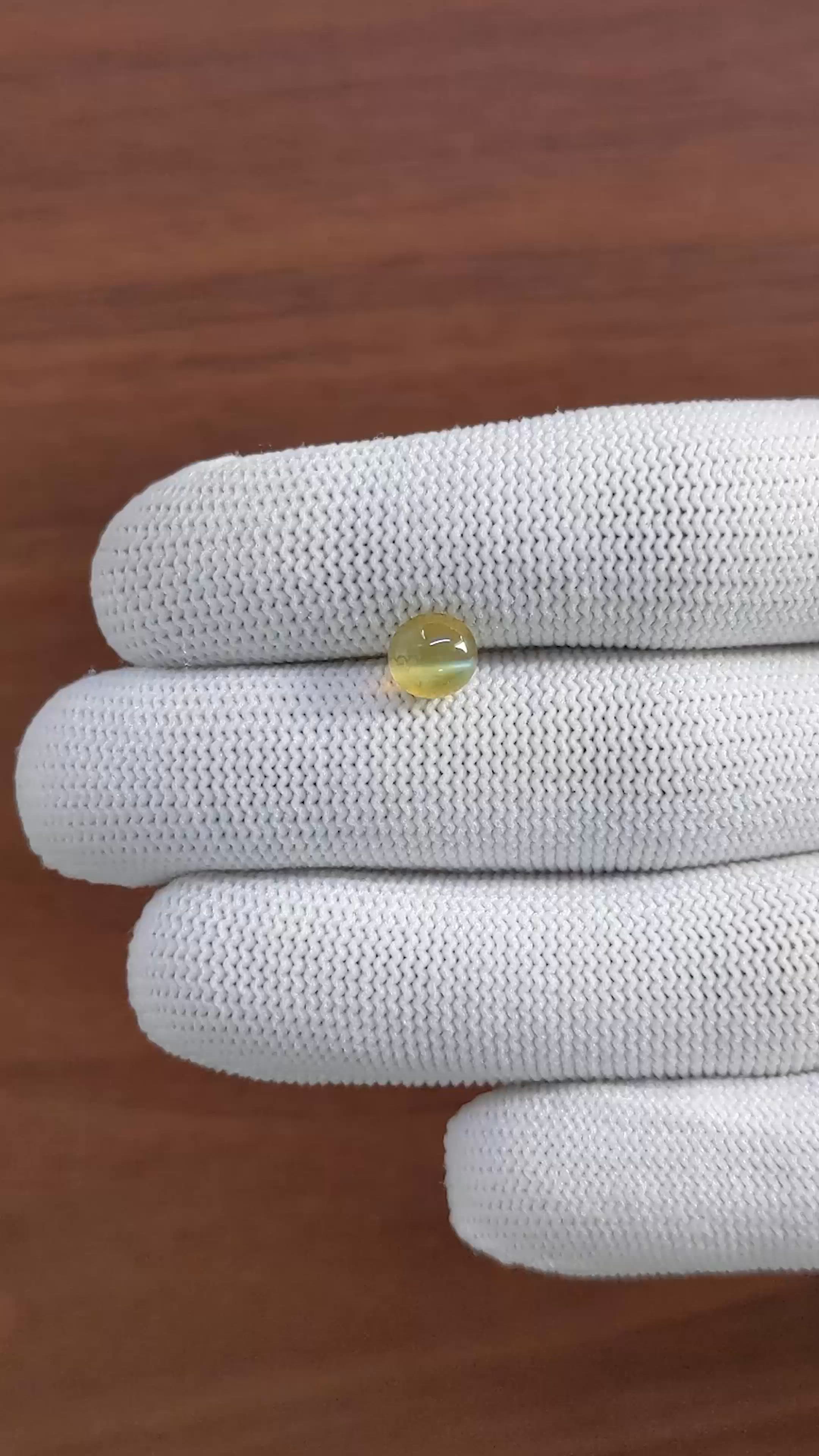 2.02 Ct. Yellowish Green Cabochon Chrysoberyl from Madagascar Size Video