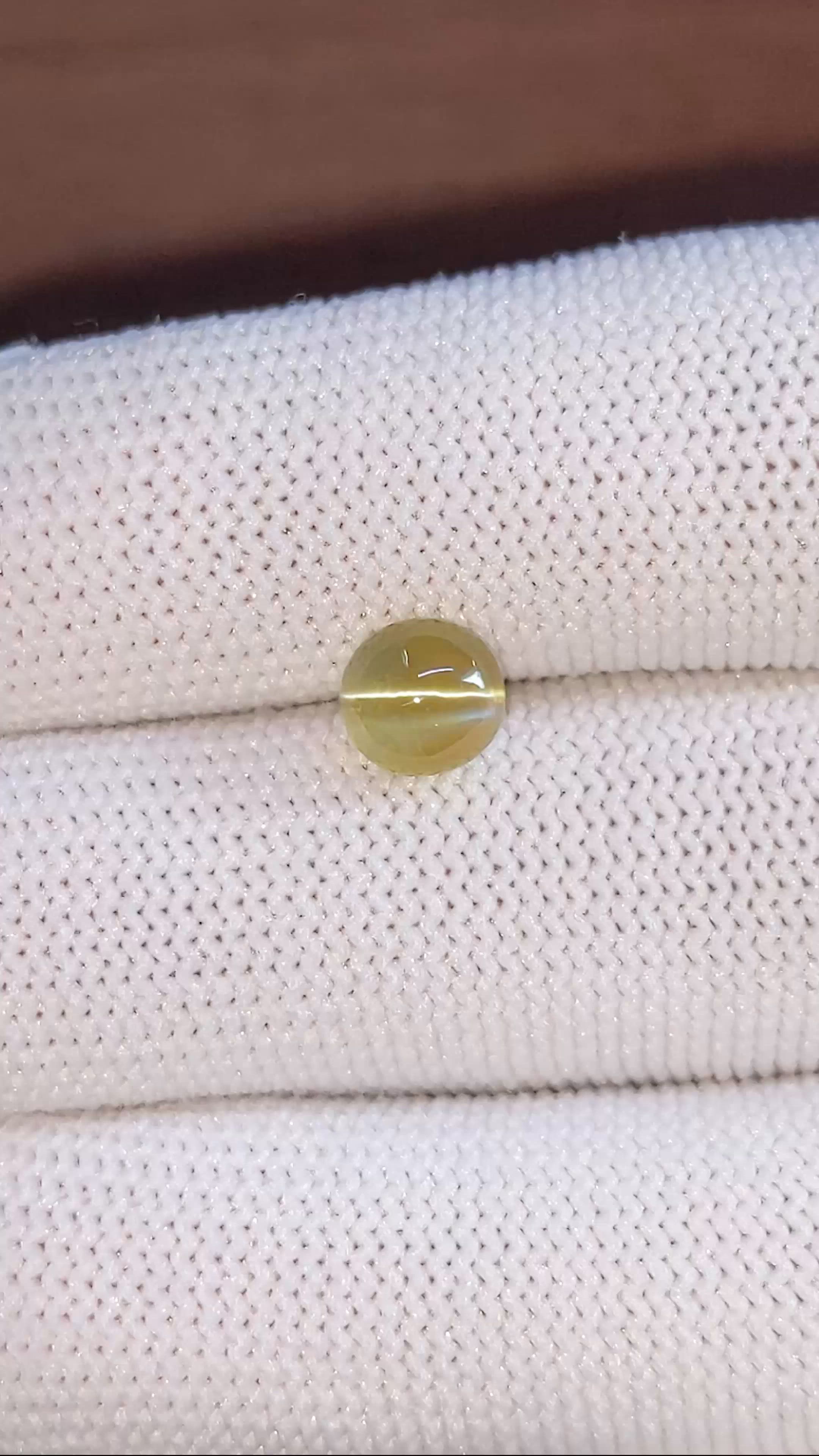 2.02 Ct. Yellowish Green Cabochon Chrysoberyl from Madagascar Size Video