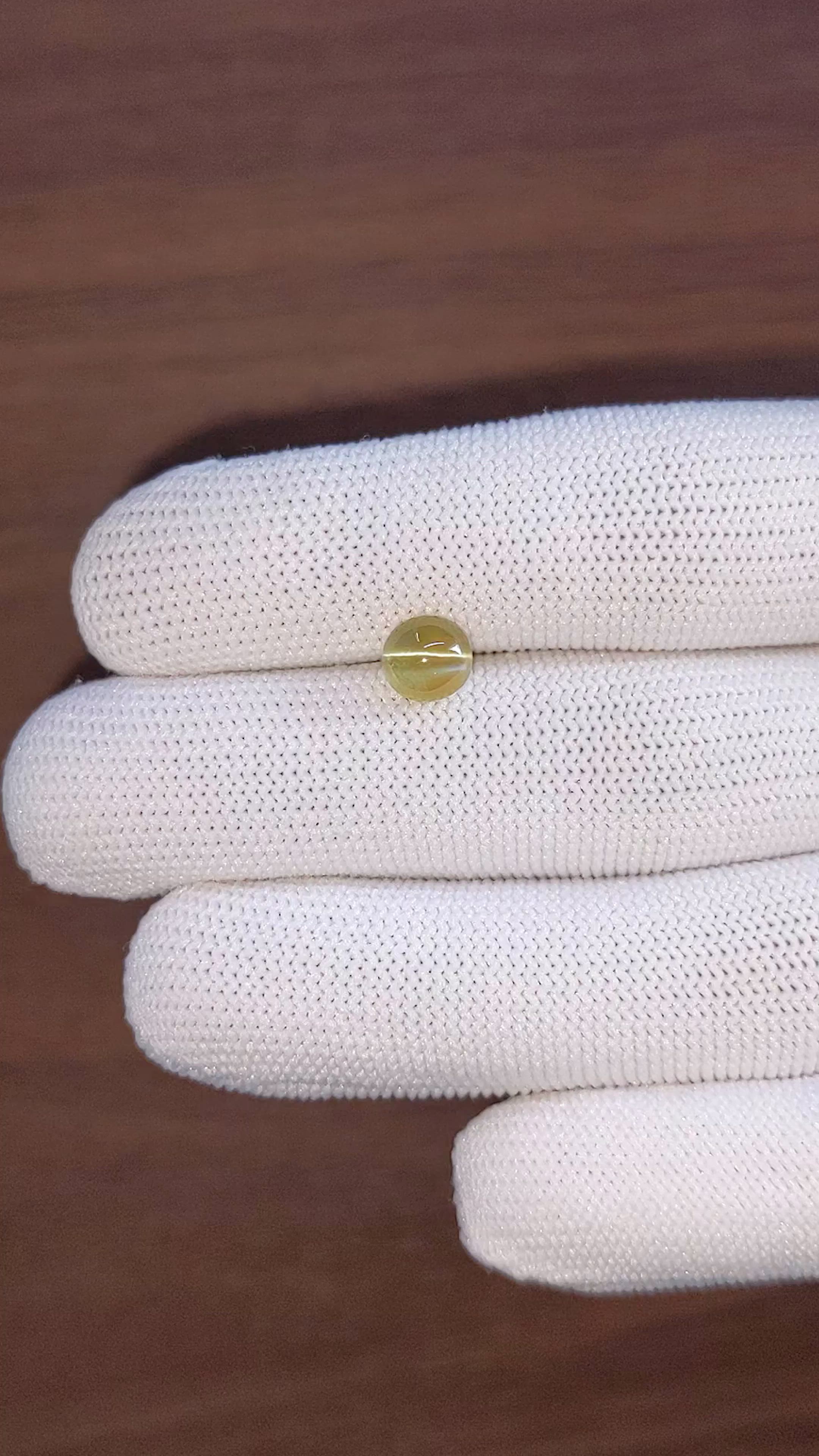 2.02 Ct. Yellowish Green Cabochon Chrysoberyl from Madagascar Size Video
