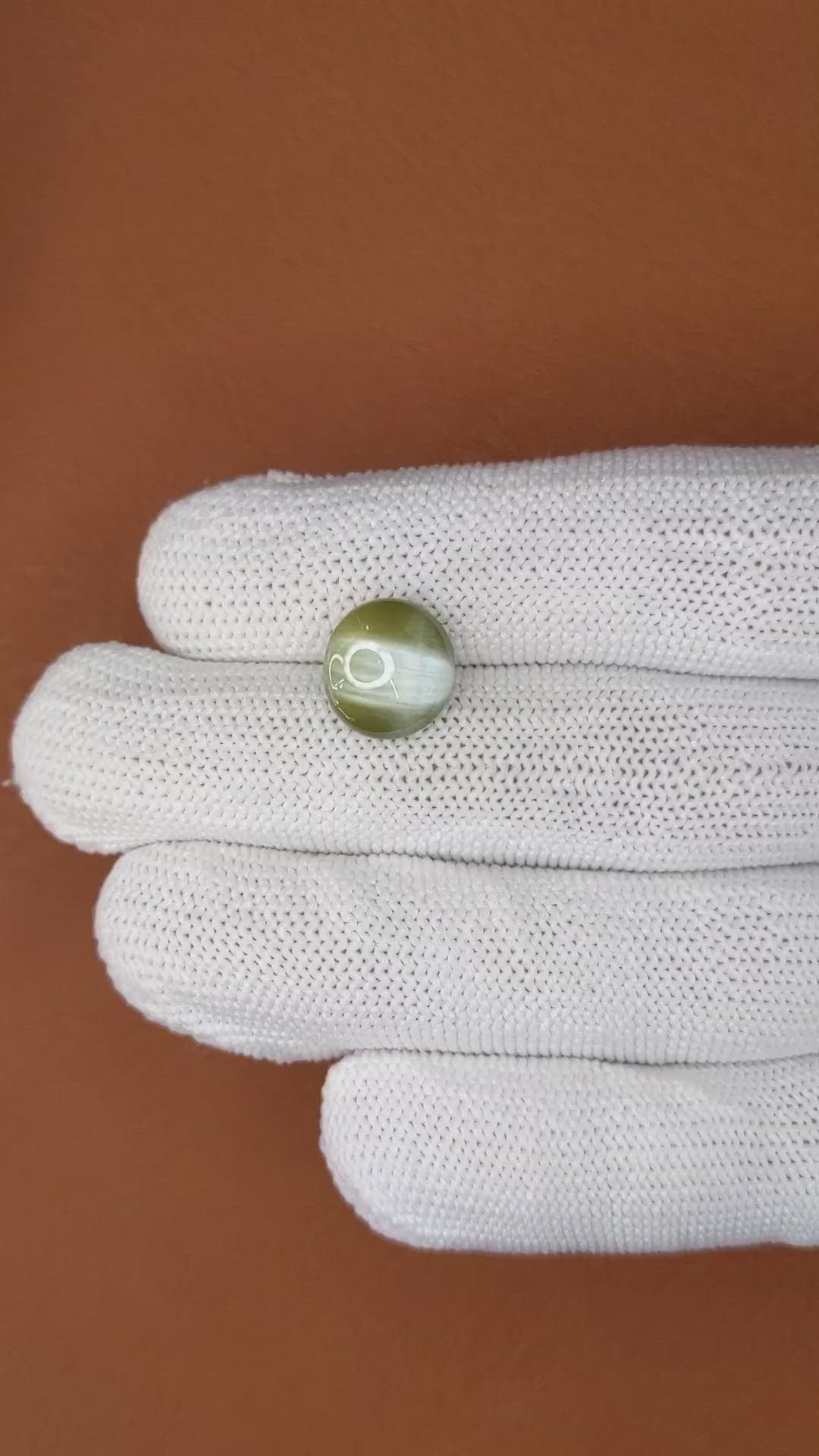 6.87 Ct. Brownish Green Cabochon Chrysoberyl from Ceylon (Sri Lanka) Size Video
