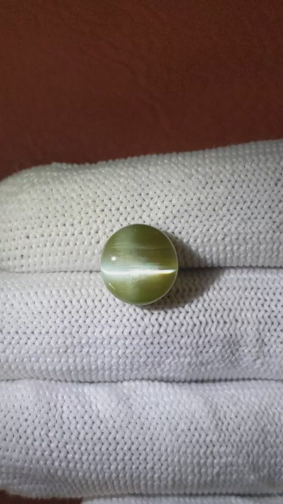 6.87 Ct. Brownish Green Cabochon Chrysoberyl from Ceylon (Sri Lanka) Size Video