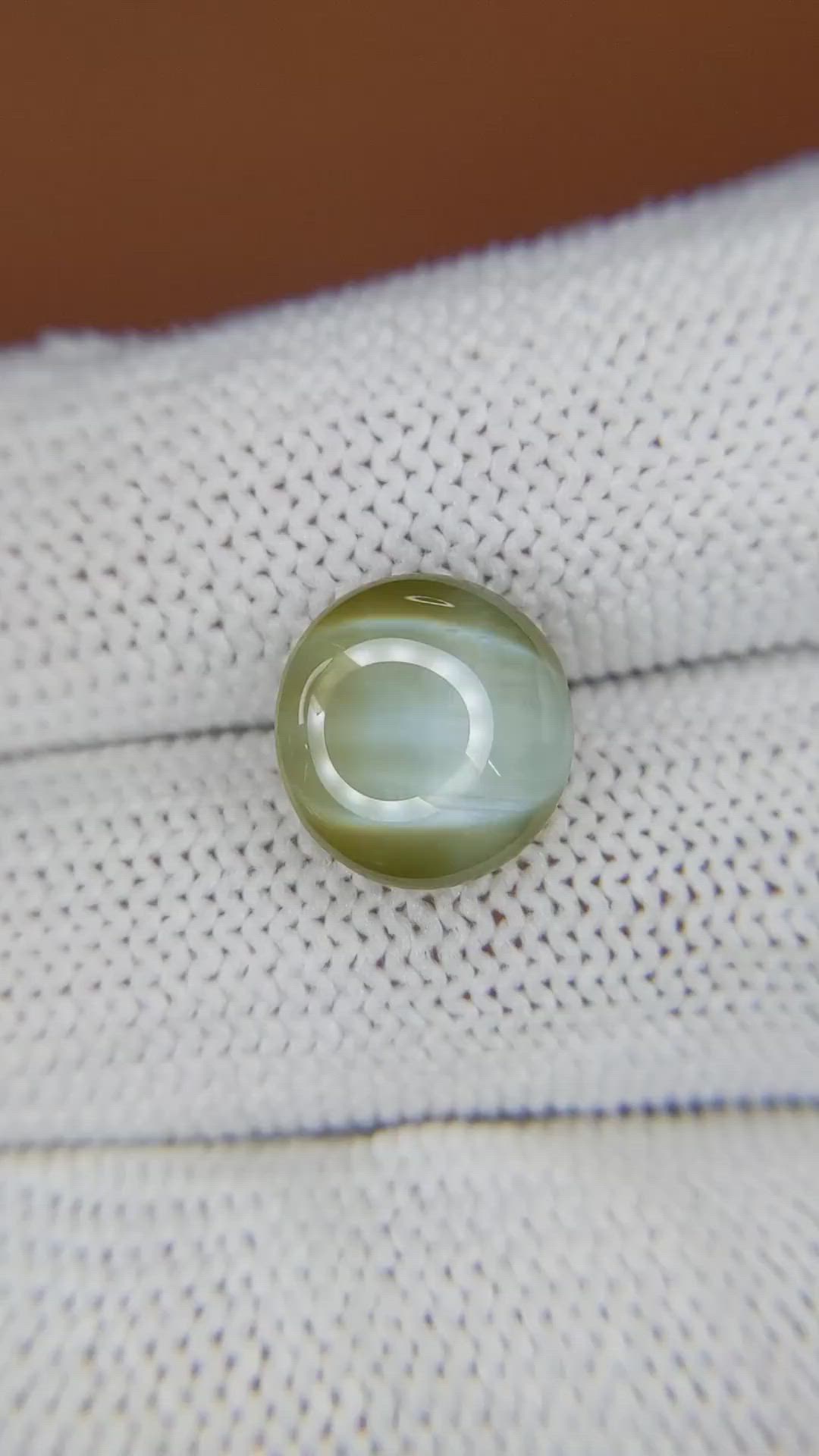 6.87 Ct. Brownish Green Cabochon Chrysoberyl from Ceylon (Sri Lanka) Size Video