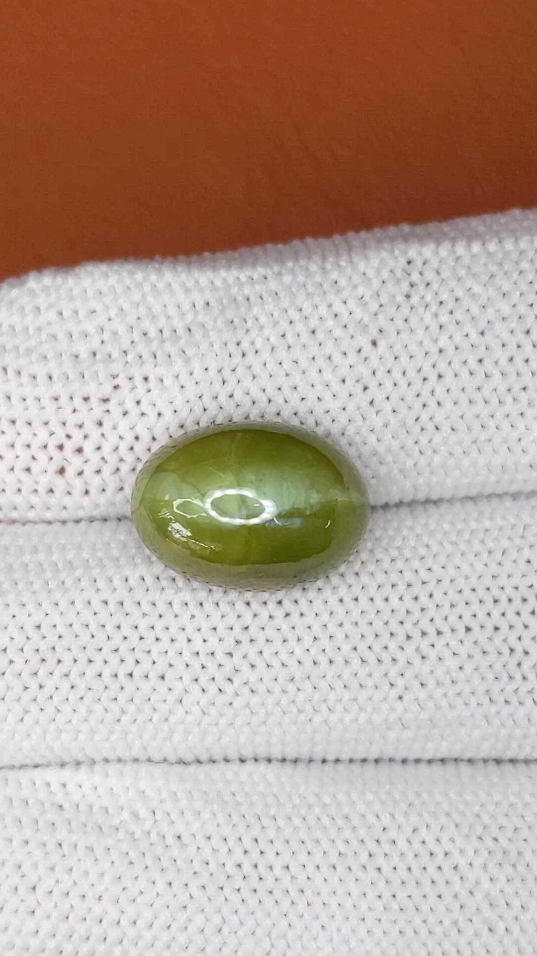 11.81 Ct. Yellowish Green Cabochon Chrysoberyl from Ceylon (Sri Lanka) Size Video