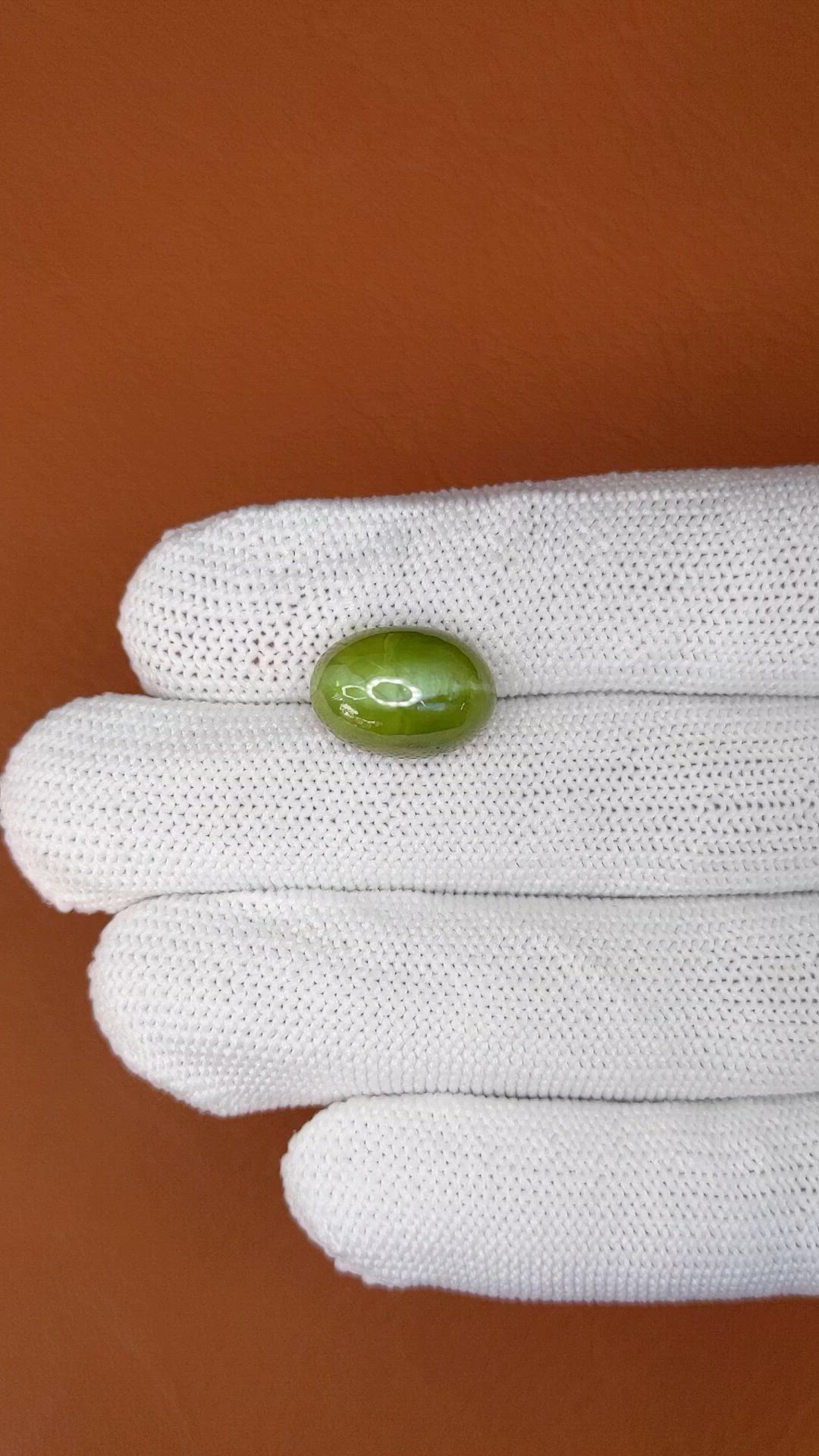 11.81 Ct. Yellowish Green Cabochon Chrysoberyl from Ceylon (Sri Lanka) Size Video