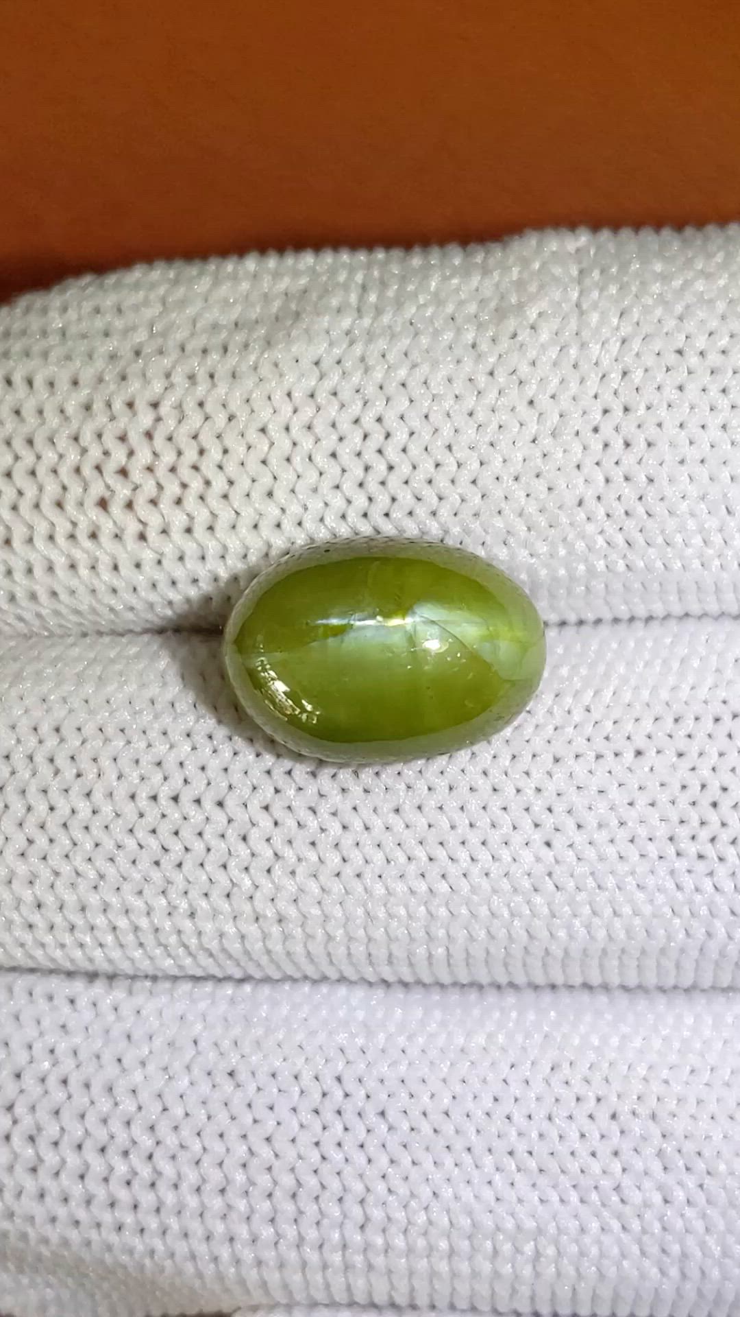 11.81 Ct. Yellowish Green Cabochon Chrysoberyl from Ceylon (Sri Lanka) Size Video