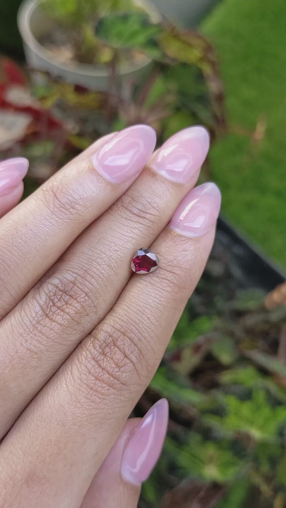 0.98 Ct. Purplish Red Rhodolite Garnet from Mozambique Size Video