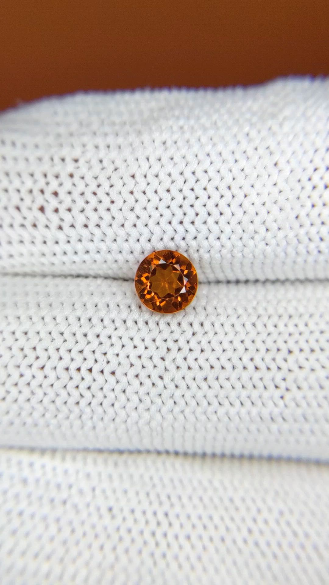 0.81 Ct. Reddish Orange Hessonite Garnet from Madagascar Size Video