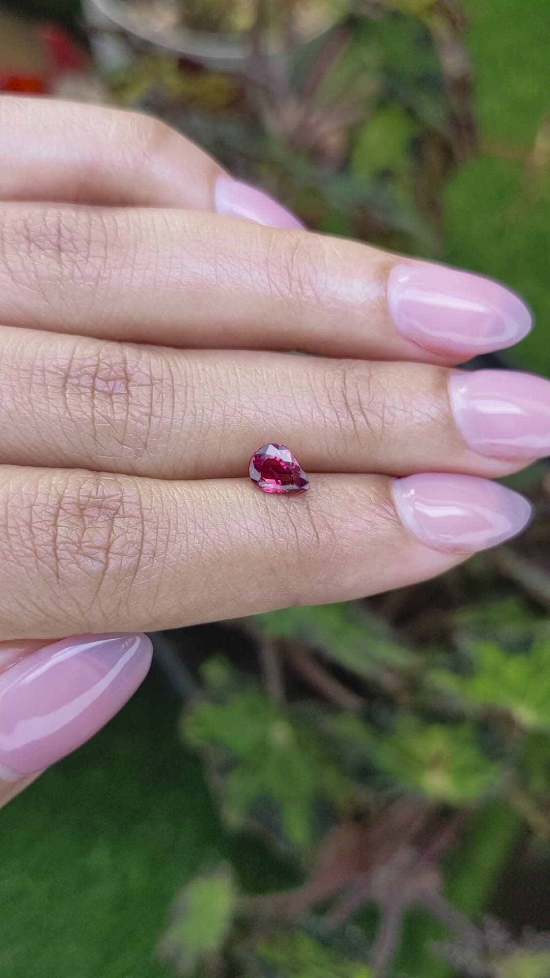 0.97 Ct. Purplish Red Almandine Garnet from Mozambique Size Video