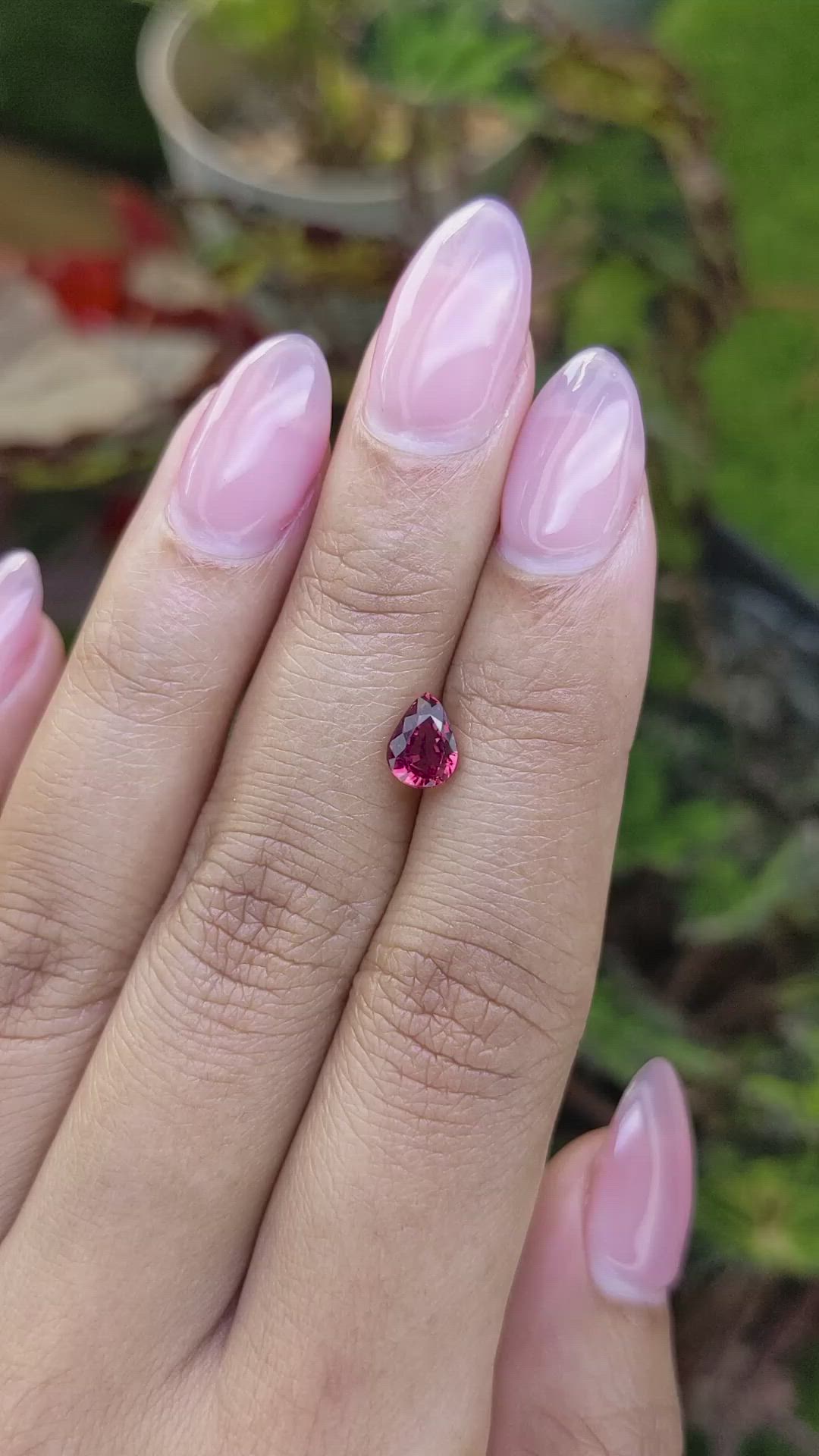 0.97 Ct. Purplish Red Almandine Garnet from Mozambique Size Video