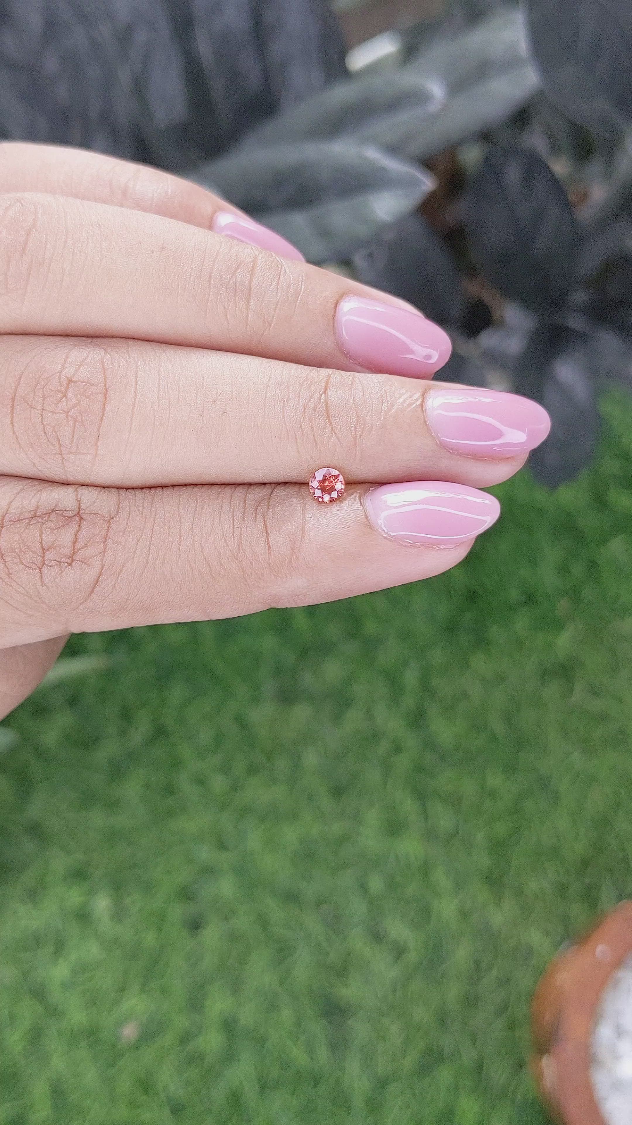 0.20 Ct. Pinkish Orange Spinel from Tanzania Size Video