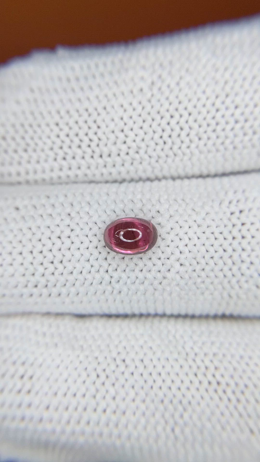 0.69 Ct. Pinkish Purple Cabochon Garnet from Ceylon (Sri Lanka) Size Video