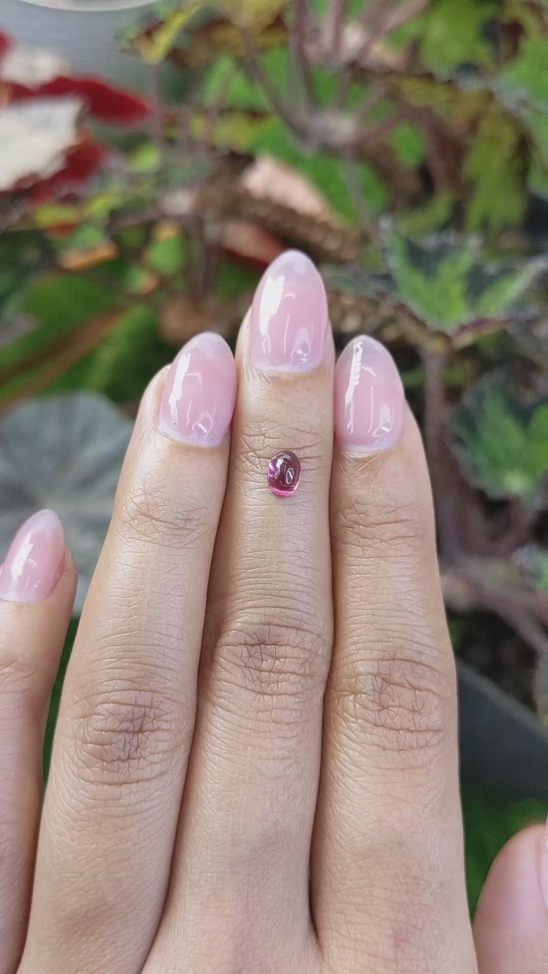 0.69 Ct. Pinkish Purple Cabochon Garnet from Ceylon (Sri Lanka) Size Video