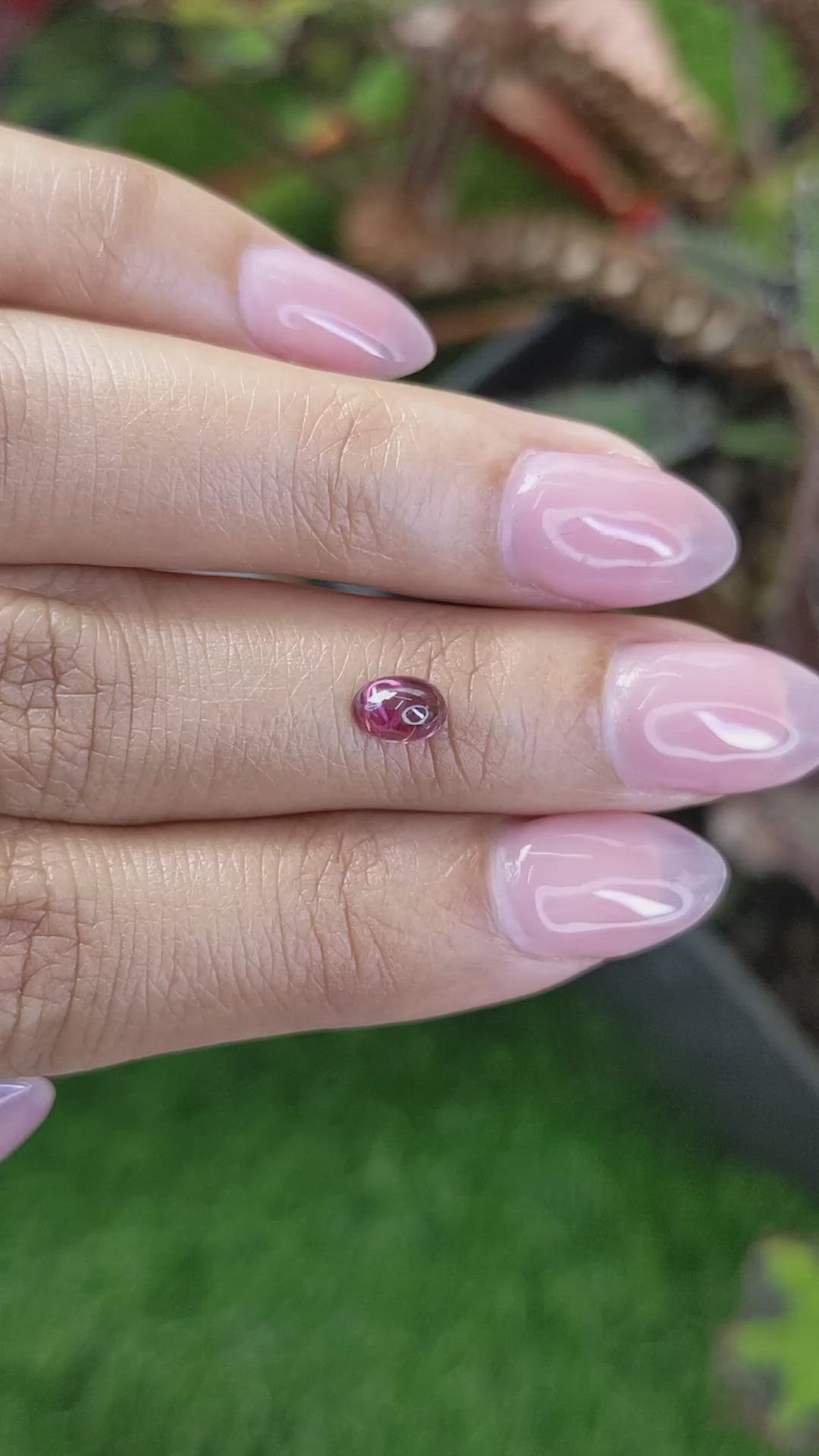 0.69 Ct. Pinkish Purple Cabochon Garnet from Ceylon (Sri Lanka) Size Video