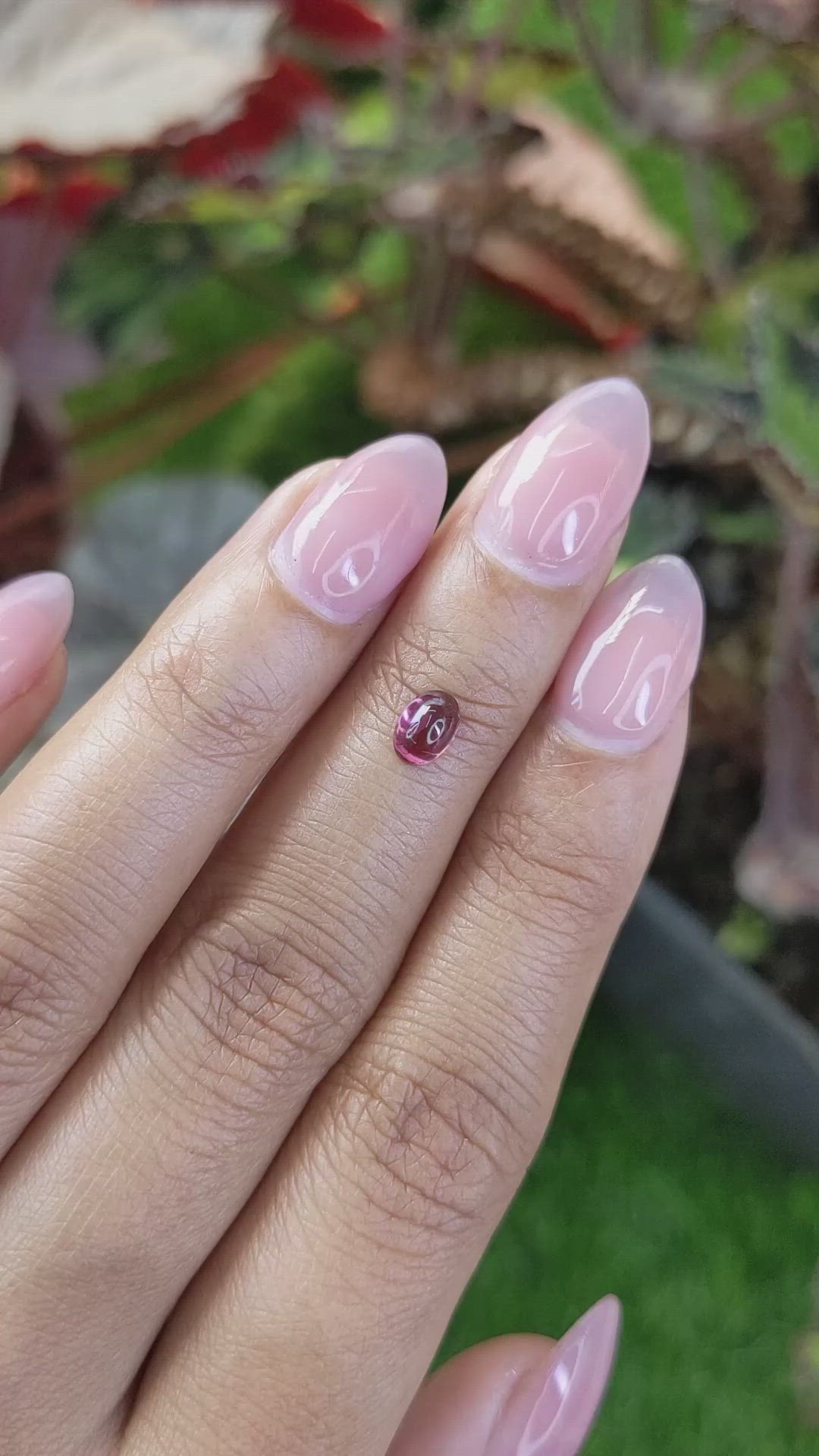 0.69 Ct. Pinkish Purple Cabochon Garnet from Ceylon (Sri Lanka) Size Video