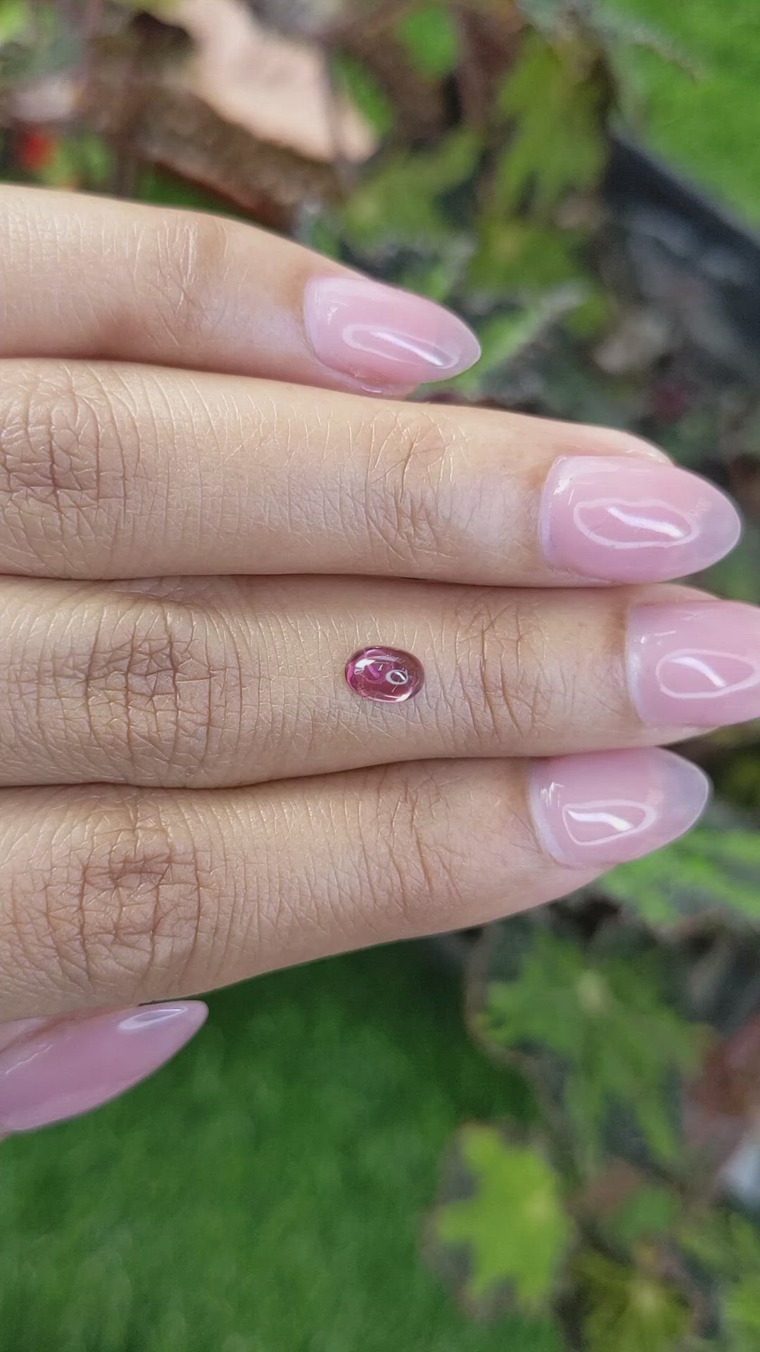0.55 Ct. Pinkish Purple Cabochon Garnet from Ceylon (Sri Lanka) Size Video
