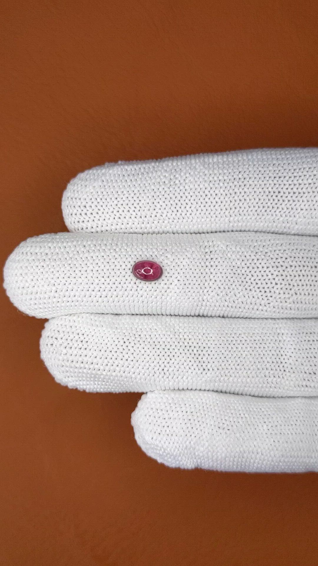0.68 Ct. Pinkish Purple Cabochon Garnet from Ceylon (Sri Lanka) Size Video