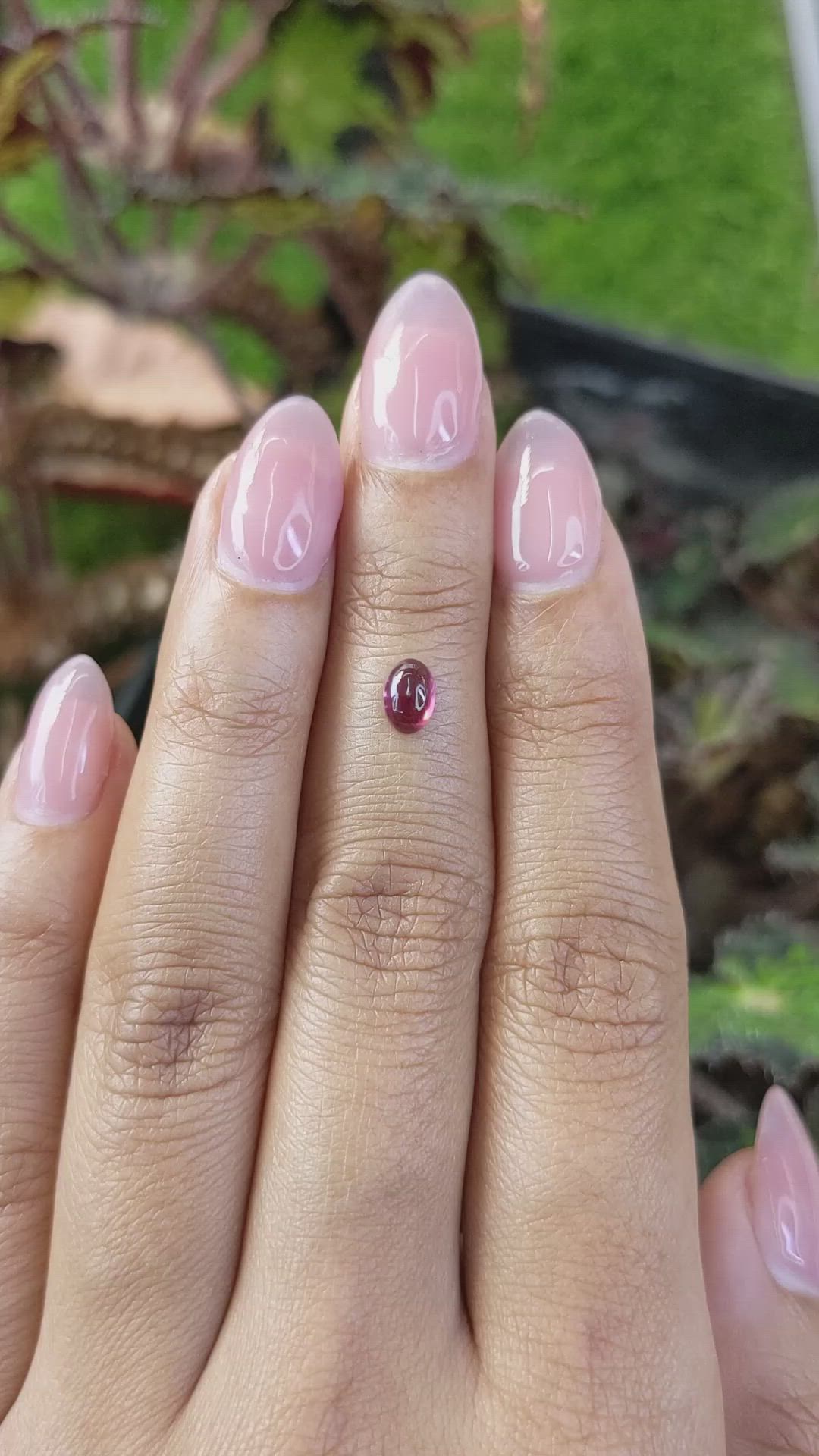 0.68 Ct. Pinkish Purple Cabochon Garnet from Ceylon (Sri Lanka) Size Video
