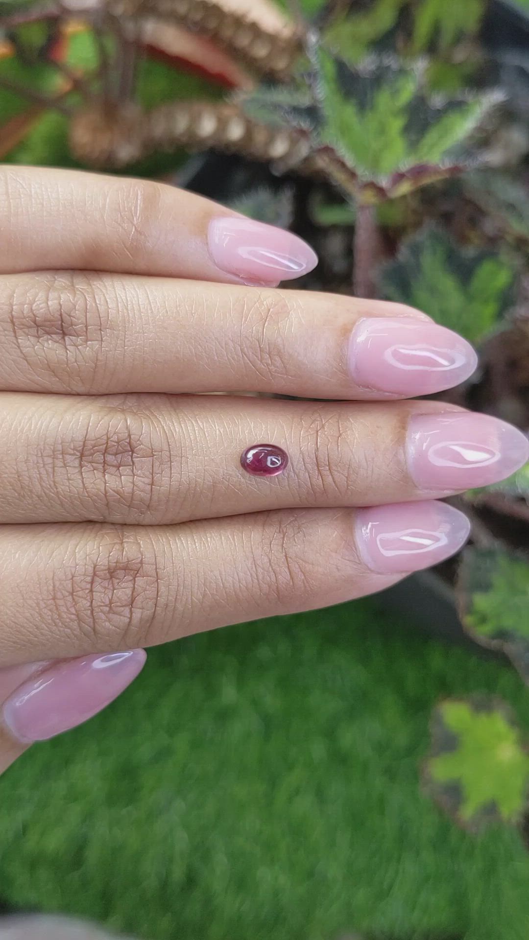 0.68 Ct. Pinkish Purple Cabochon Garnet from Ceylon (Sri Lanka) Size Video