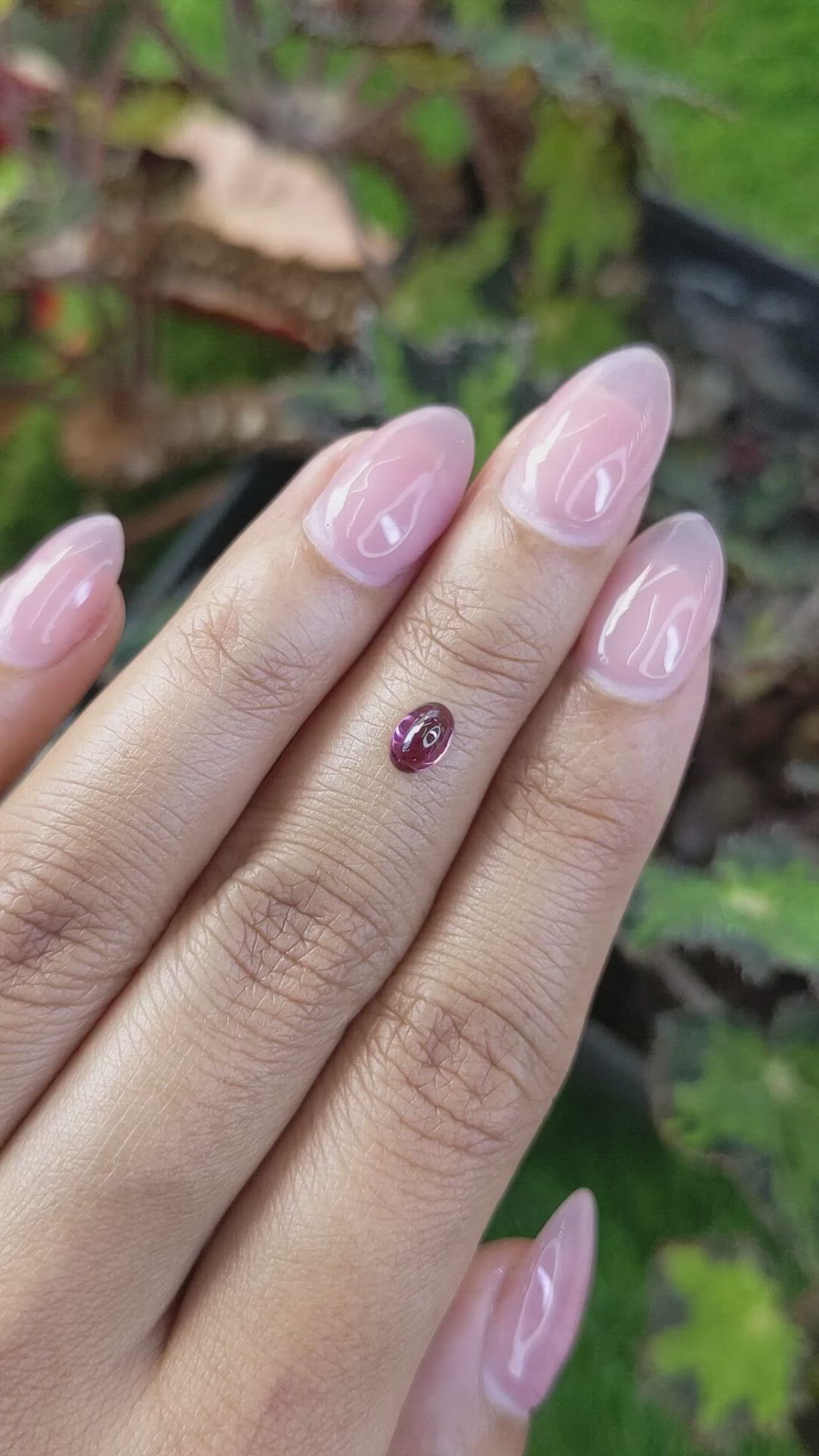 0.60 Ct. Pinkish Purple Cabochon Garnet from Ceylon (Sri Lanka) Size Video