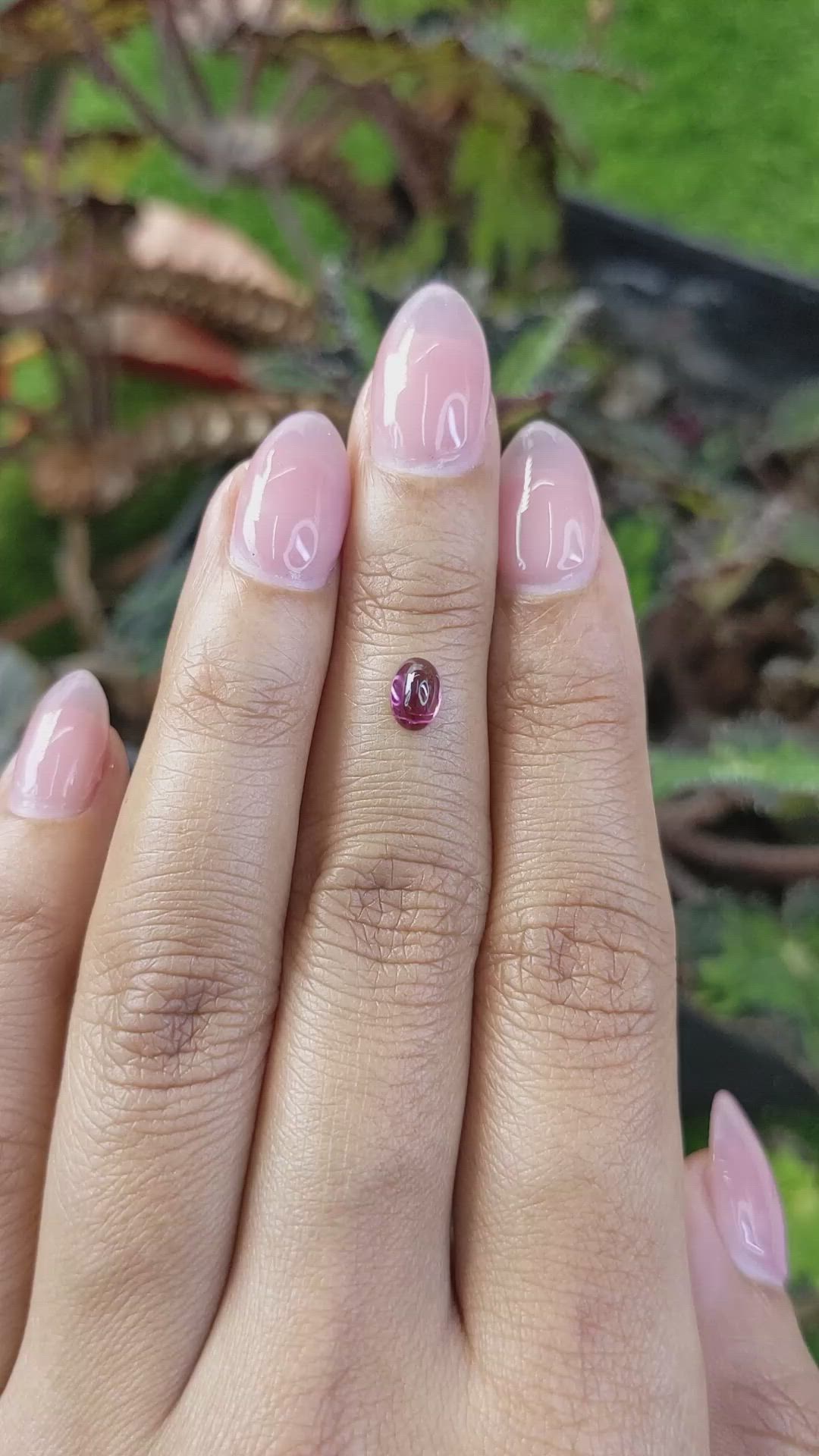 0.60 Ct. Pinkish Purple Cabochon Garnet from Ceylon (Sri Lanka) Size Video