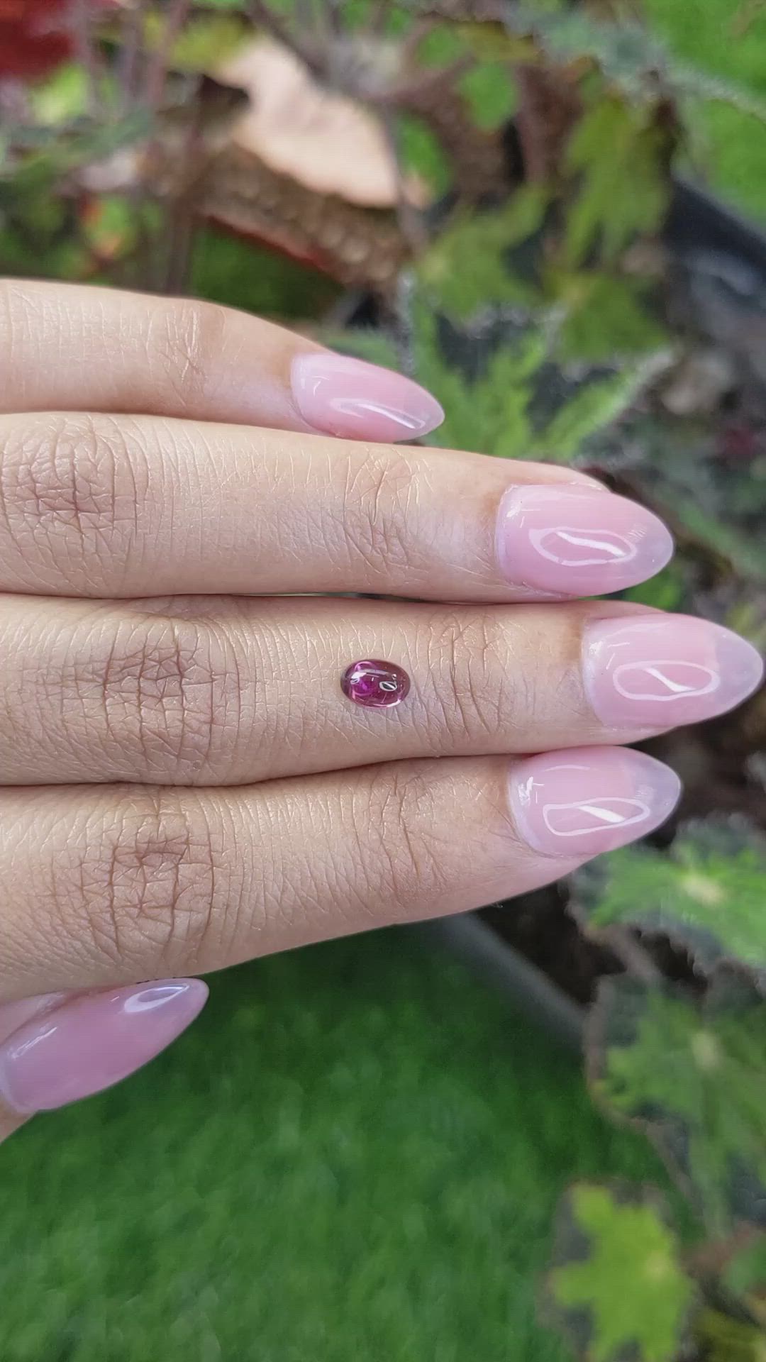 0.60 Ct. Pinkish Purple Cabochon Garnet from Ceylon (Sri Lanka) Size Video