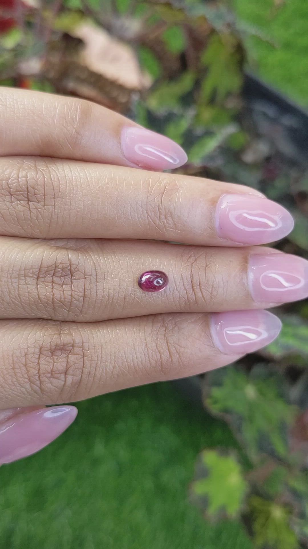 0.65 Ct. Pinkish Purple Cabochon Garnet from Ceylon (Sri Lanka) Size Video