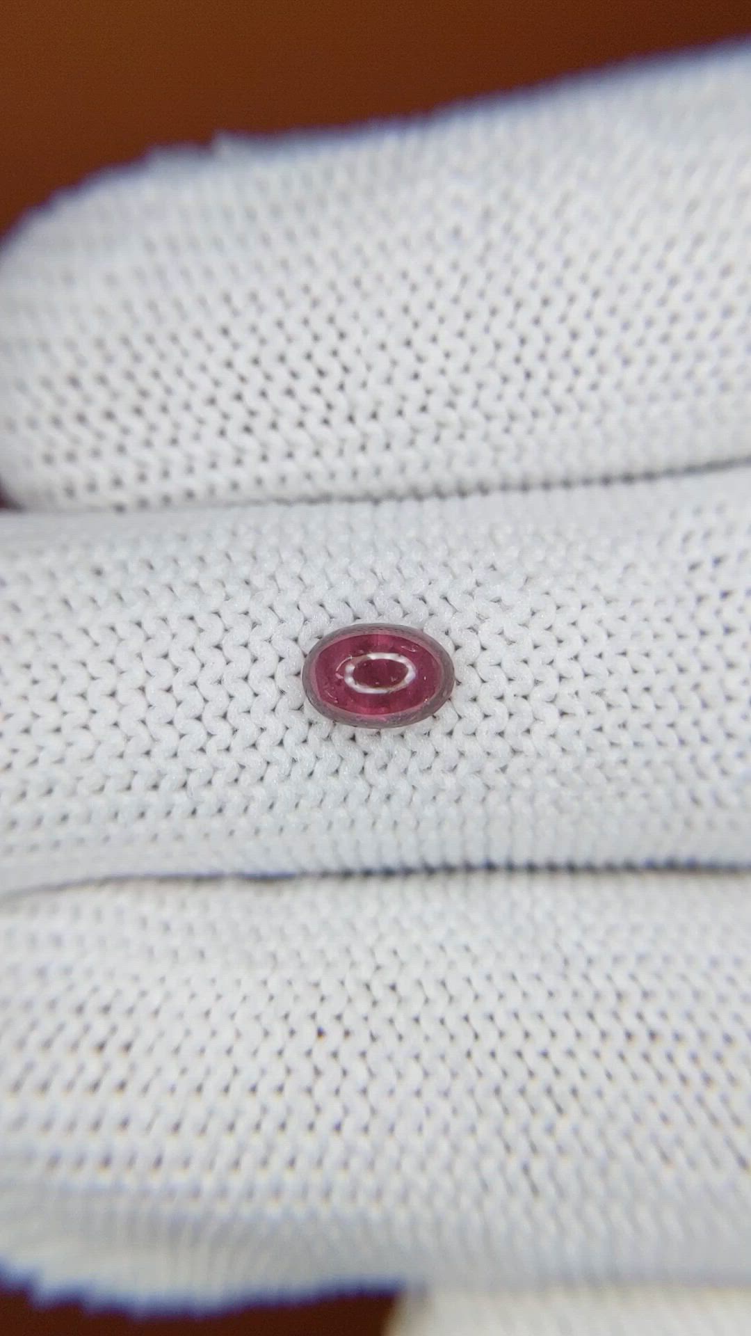 0.65 Ct. Pinkish Purple Cabochon Garnet from Ceylon (Sri Lanka) Size Video