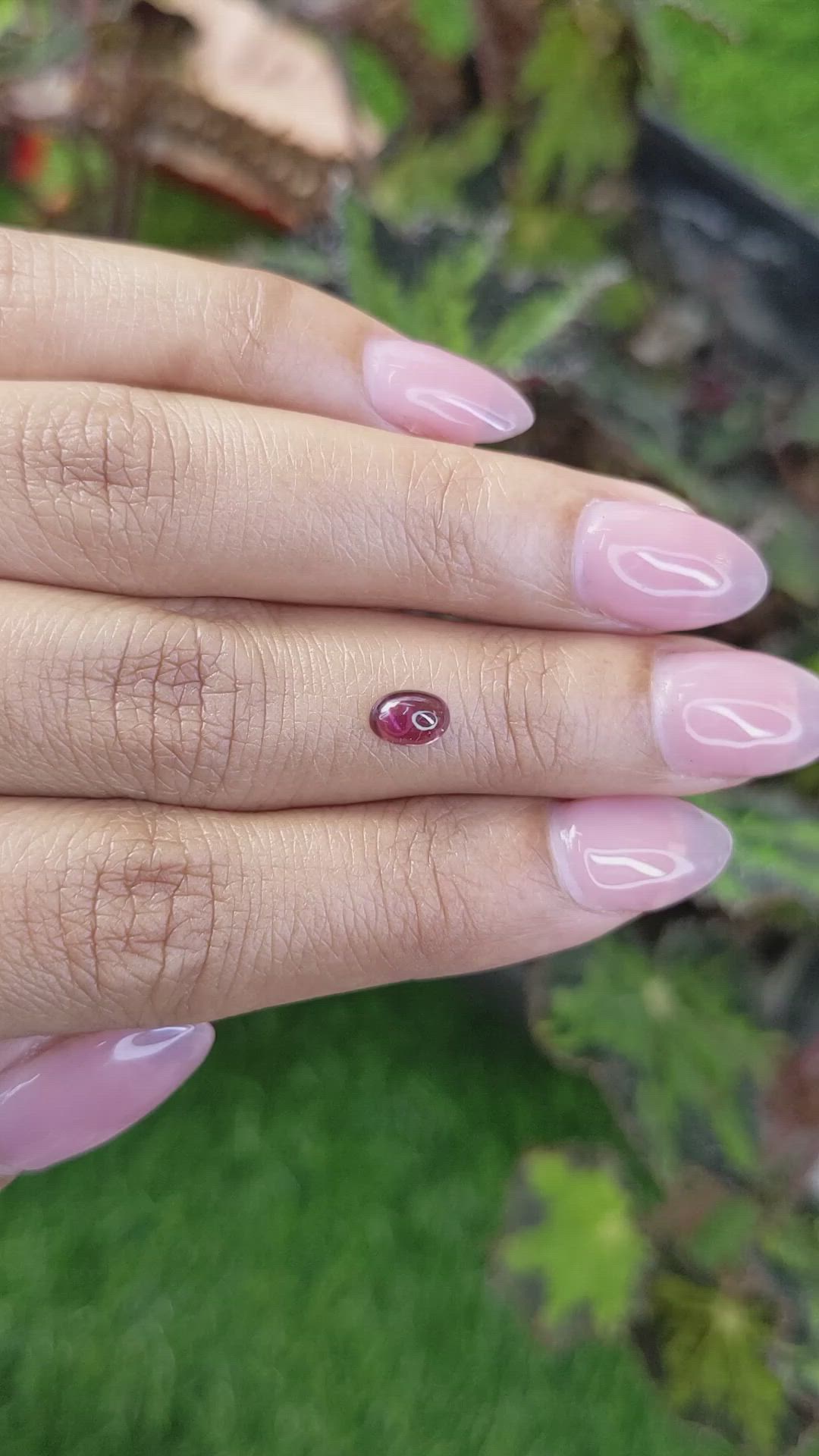 0.67 Ct. Pinkish Purple Cabochon Garnet from Ceylon (Sri Lanka) Size Video