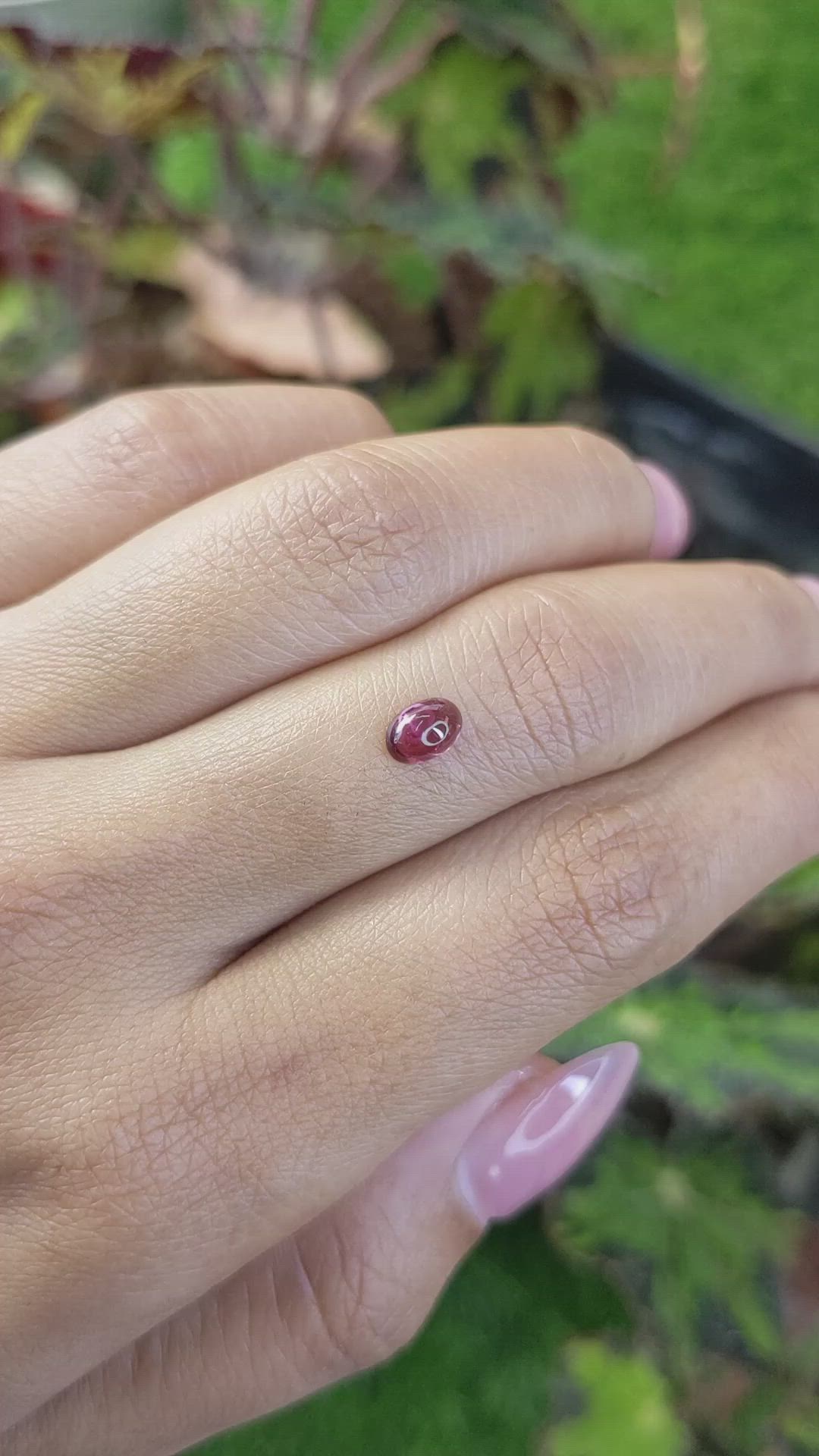 0.67 Ct. Pinkish Purple Cabochon Garnet from Ceylon (Sri Lanka) Size Video