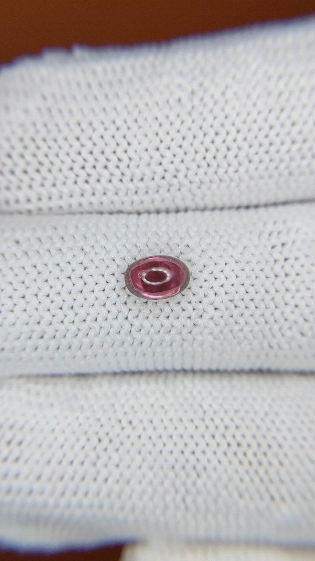 0.69 Ct. Pinkish Purple Cabochon Garnet from Ceylon (Sri Lanka) Size Video