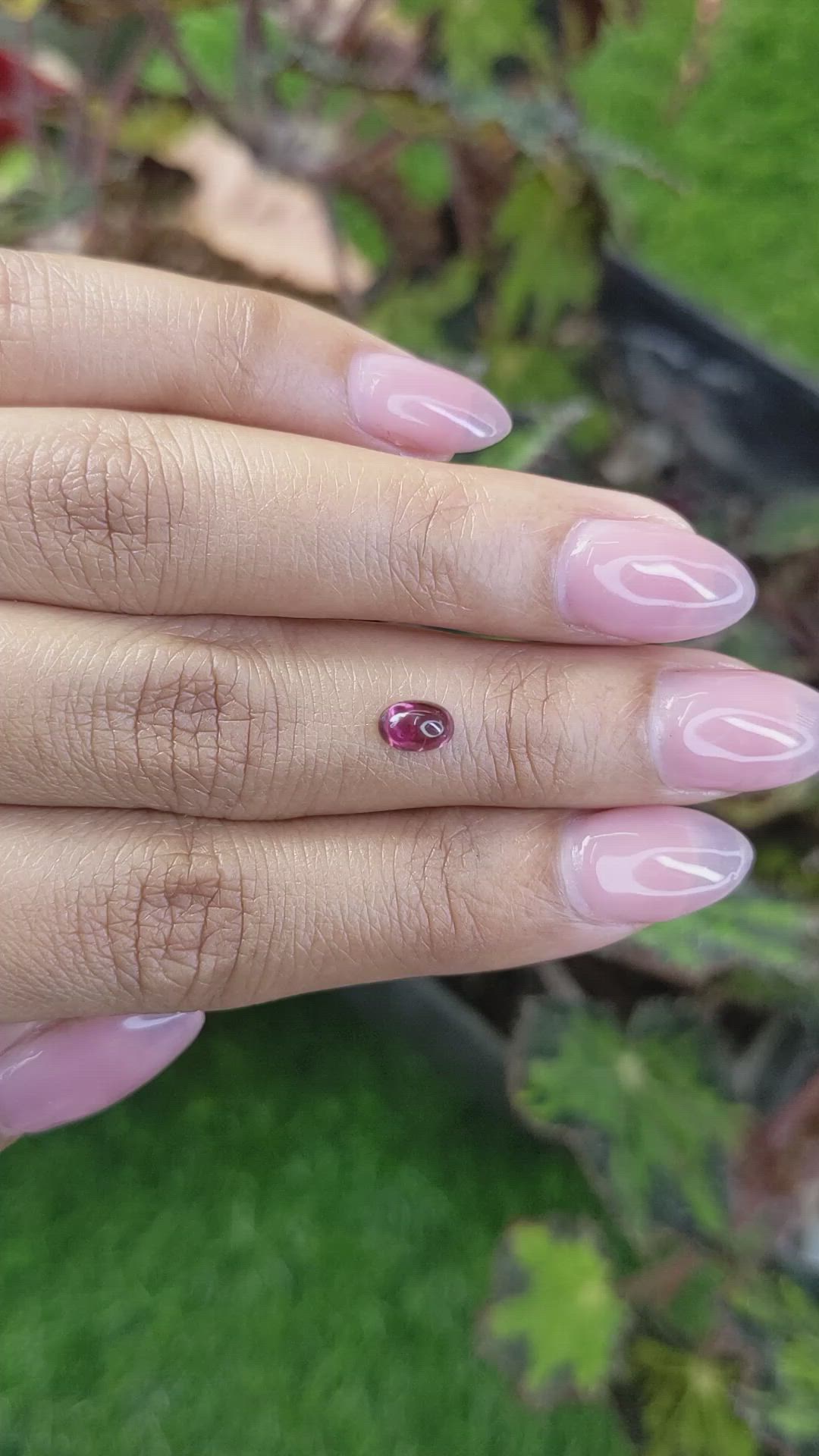 0.69 Ct. Pinkish Purple Cabochon Garnet from Ceylon (Sri Lanka) Size Video