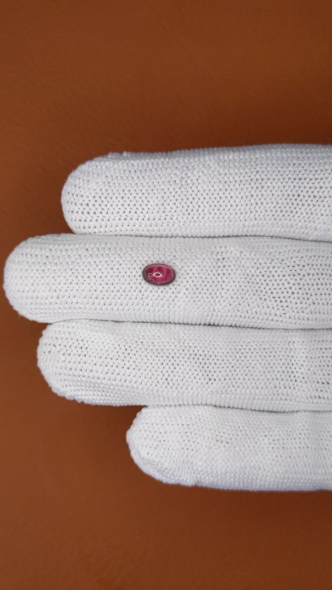 0.69 Ct. Pinkish Purple Cabochon Garnet from Ceylon (Sri Lanka) Size Video