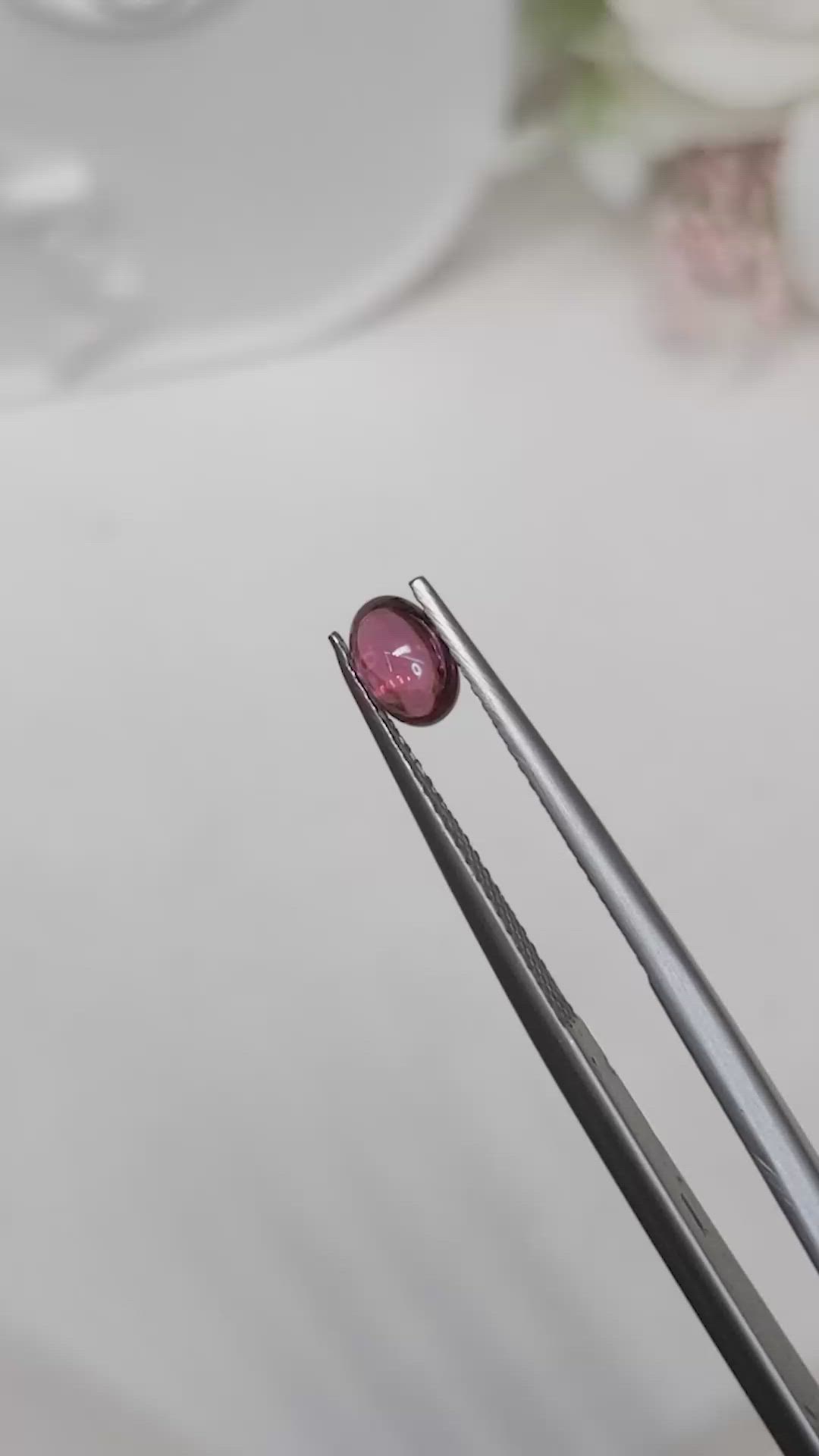 0.69 Ct. Pinkish Purple Cabochon Garnet from Ceylon (Sri Lanka) Size Video